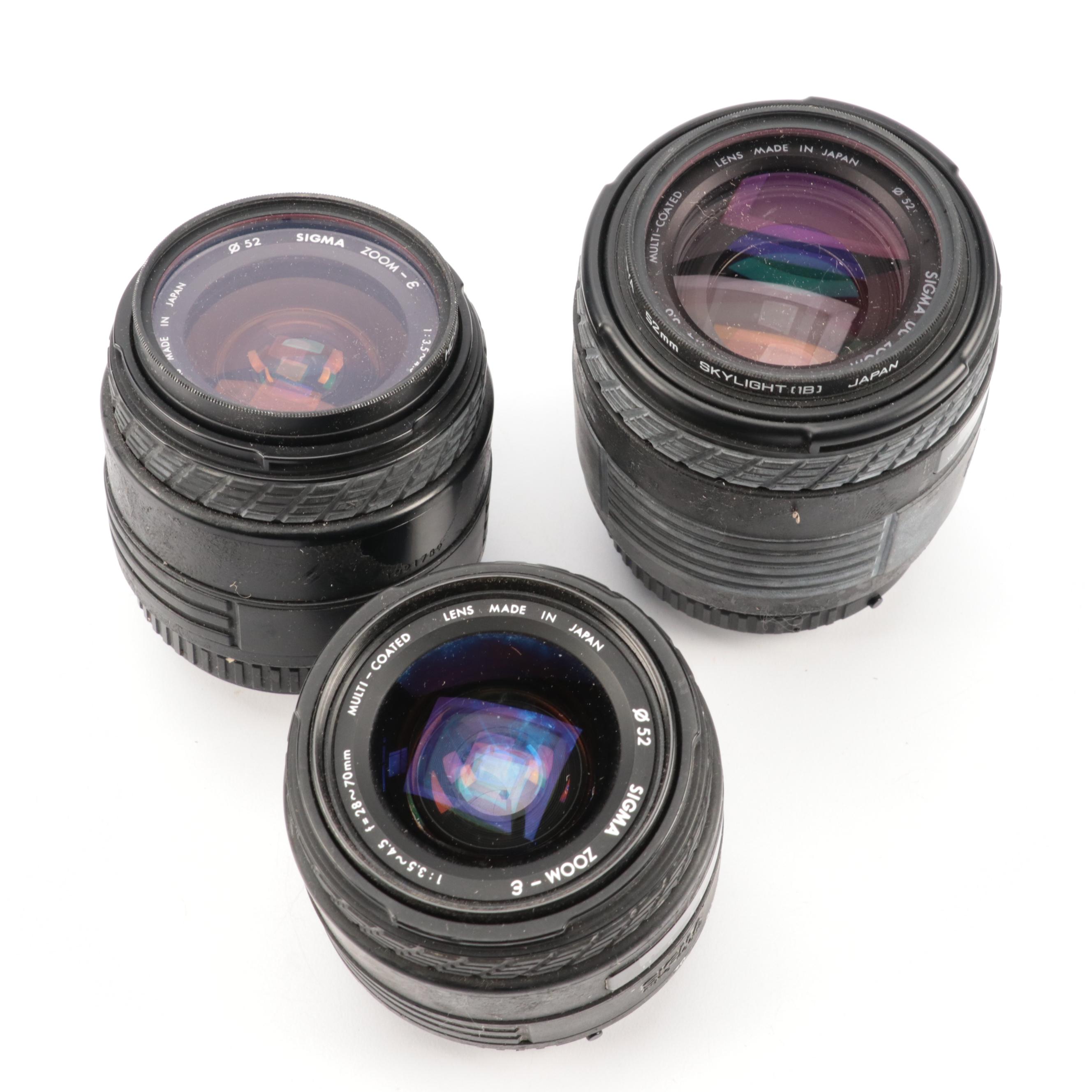 Canon A-1 and Pentax K1000 SLR Cameras with Sigma Lenses