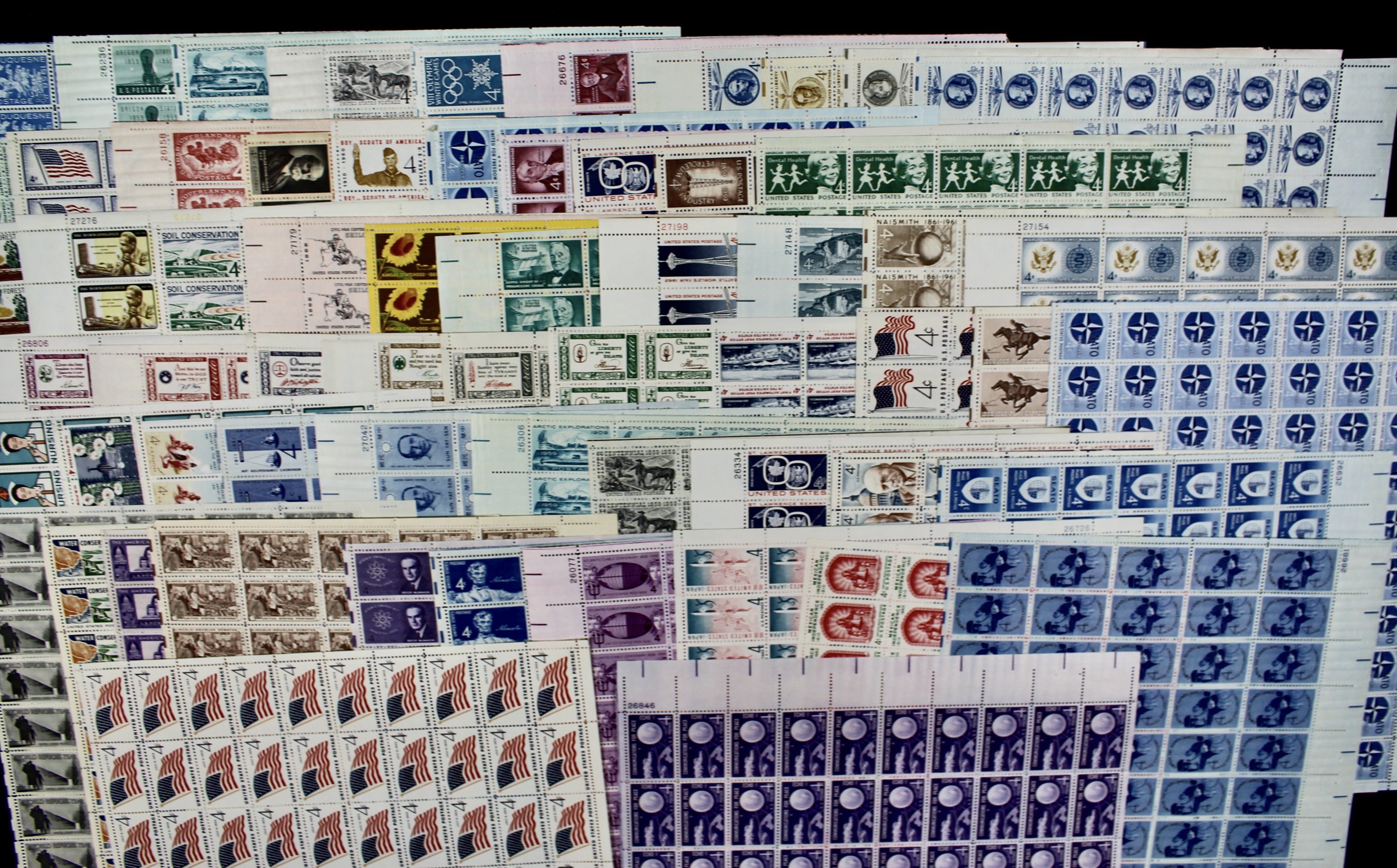 Sixty-One Different 4-Cent Postage Stamp Sheets, 1950s-1960s