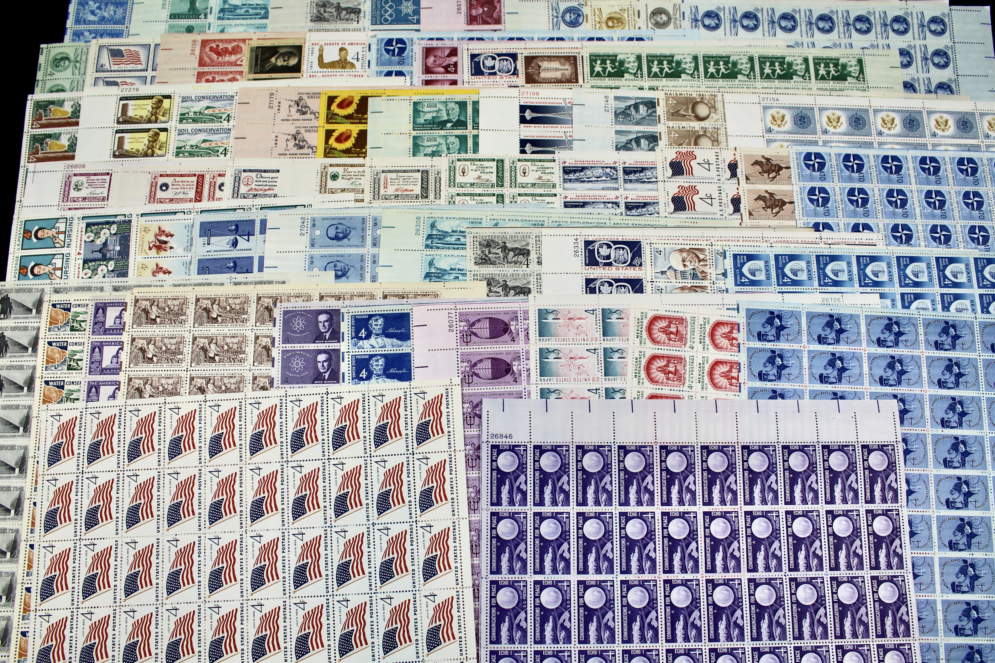 Sixty-One Different 4-Cent Postage Stamp Sheets, 1950s-1960s