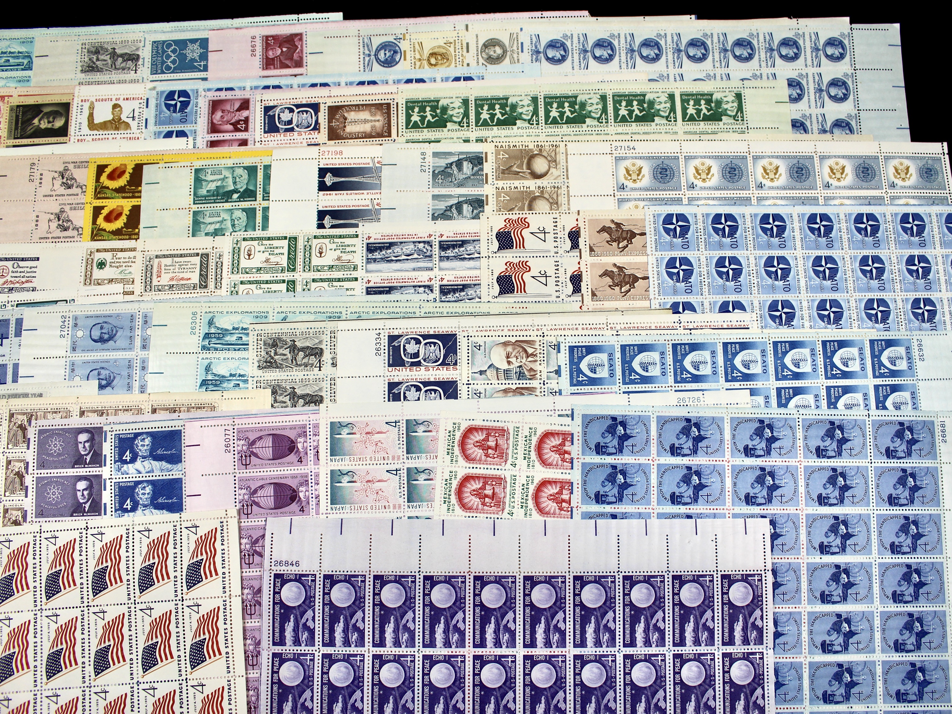Sixty-One Different 4-Cent Postage Stamp Sheets, 1950s-1960s