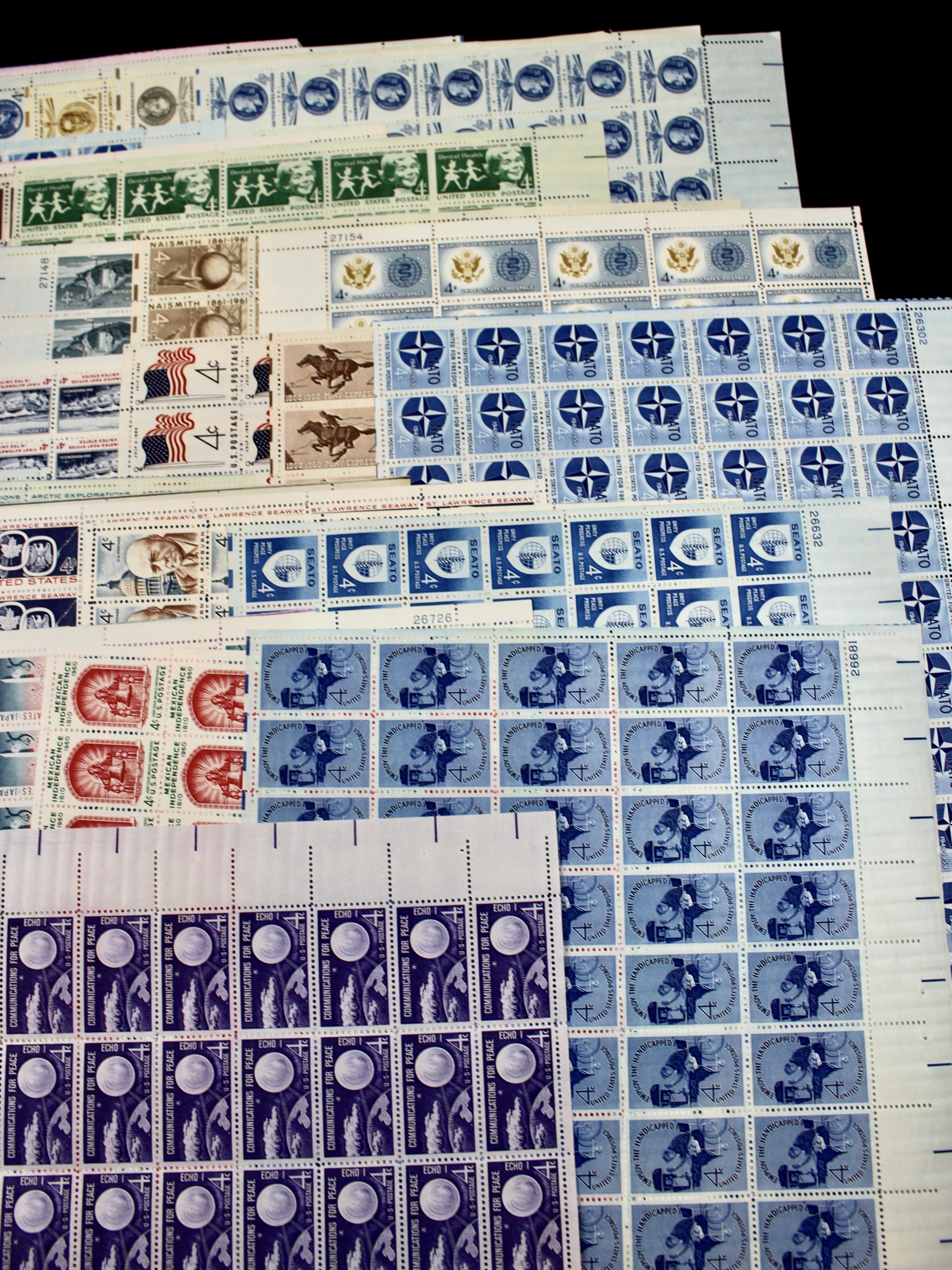 Sixty-One Different 4-Cent Postage Stamp Sheets, 1950s-1960s