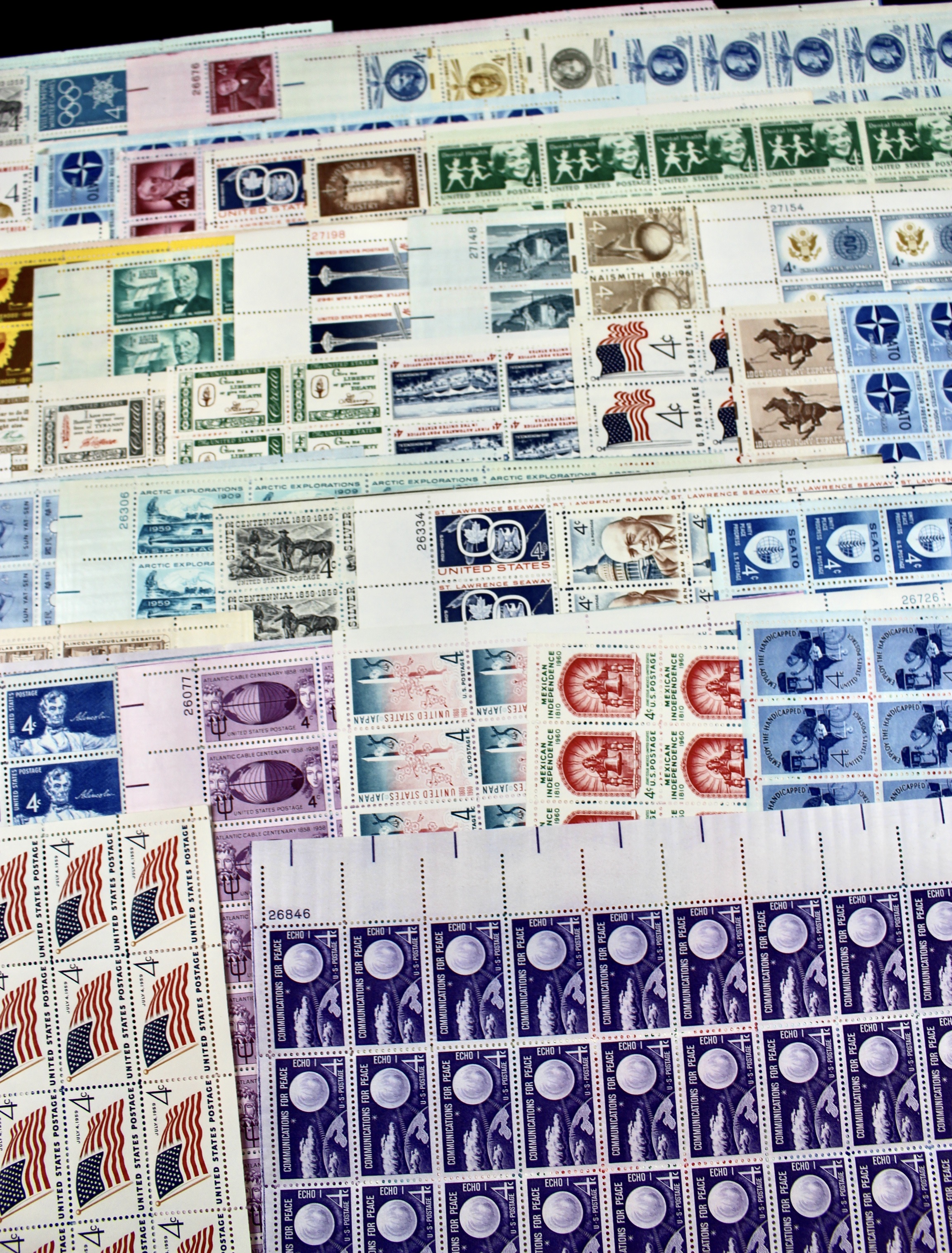 Sixty-One Different 4-Cent Postage Stamp Sheets, 1950s-1960s