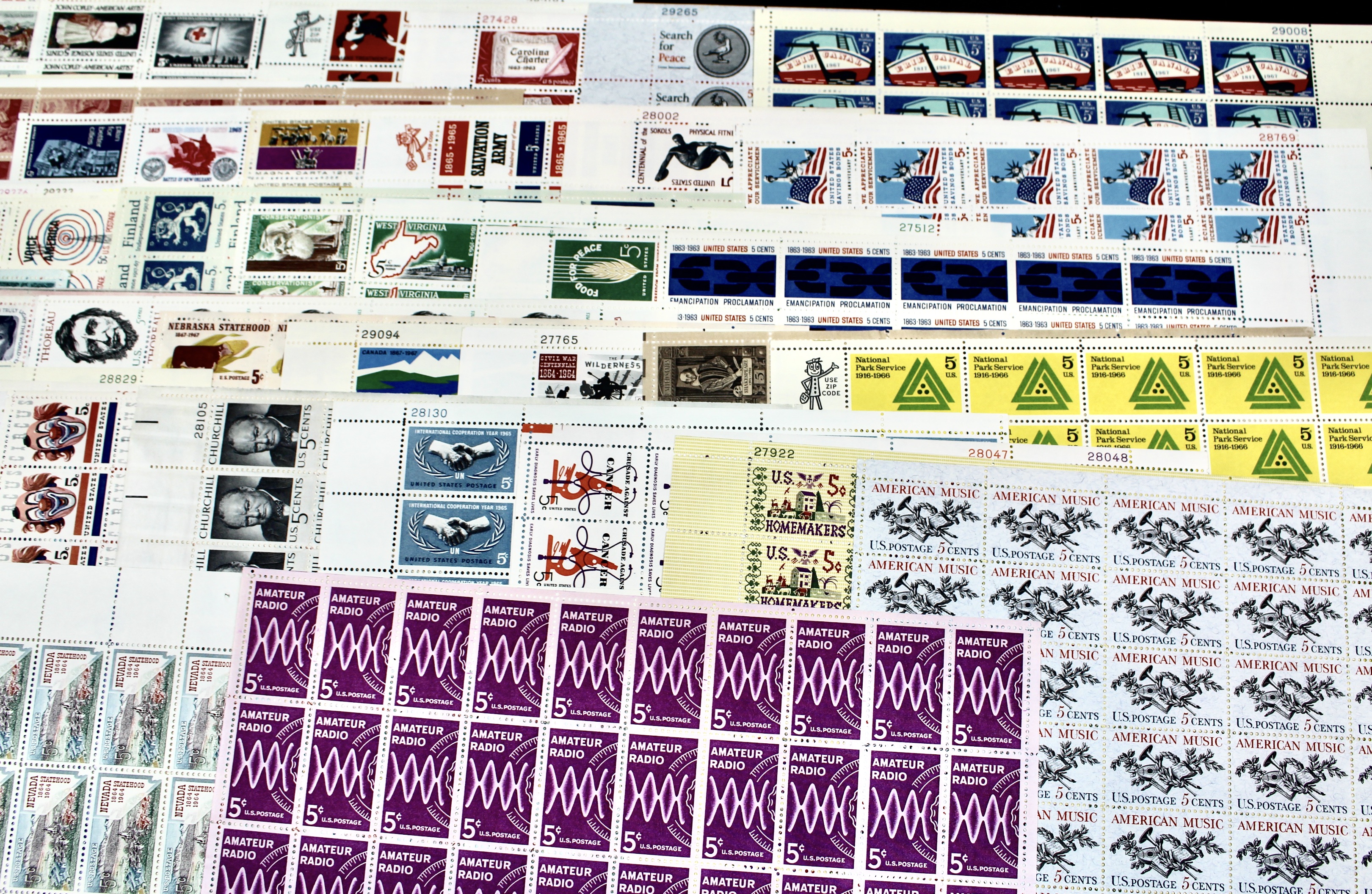 Fifty-Three Different 5-Cent Postage Stamp Sheets, 1960s