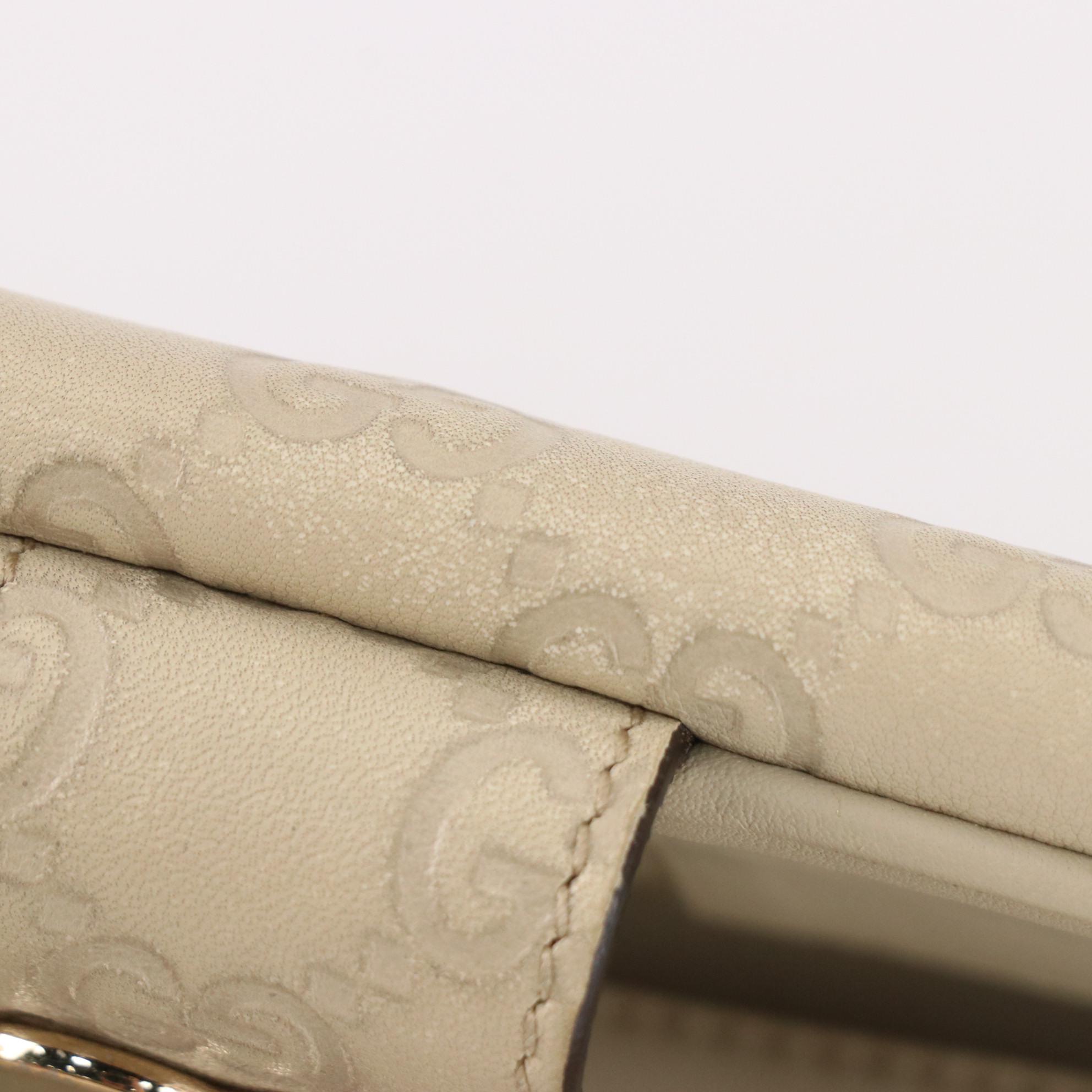 Gucci Heart Continental Wallet in Guccissima Leather