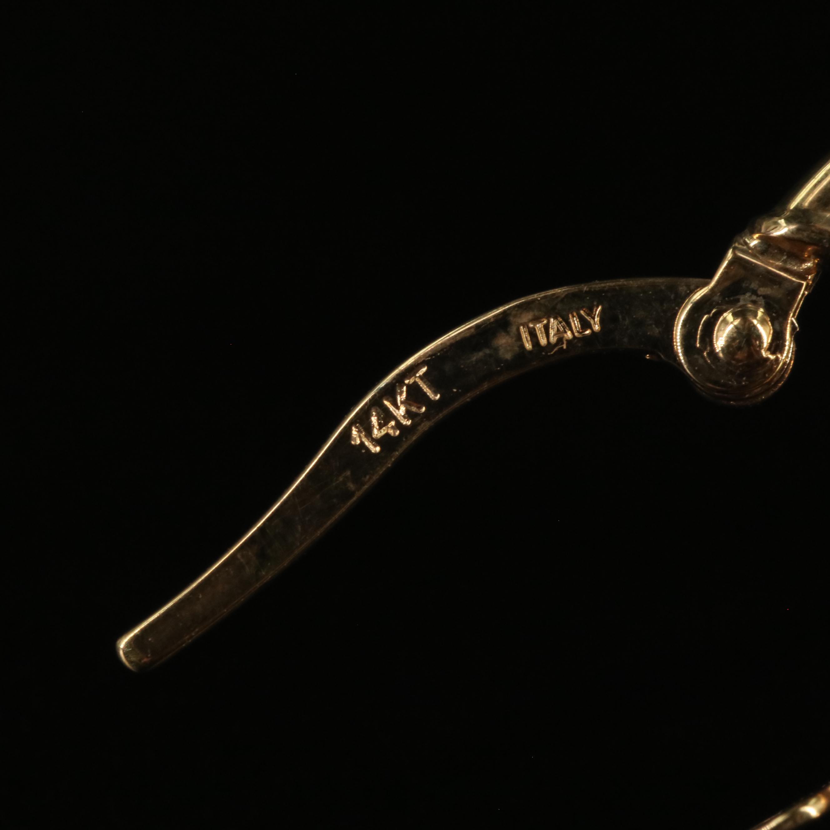 14K Oval Twist Hoop Earrings