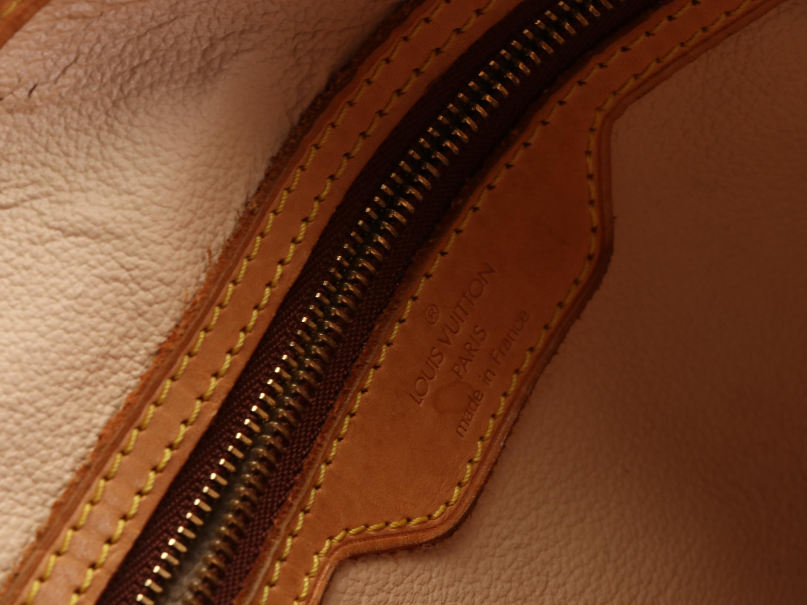 Louis Vuitton Bucket Bag GM and Zip Pouch in Monogram Canvas