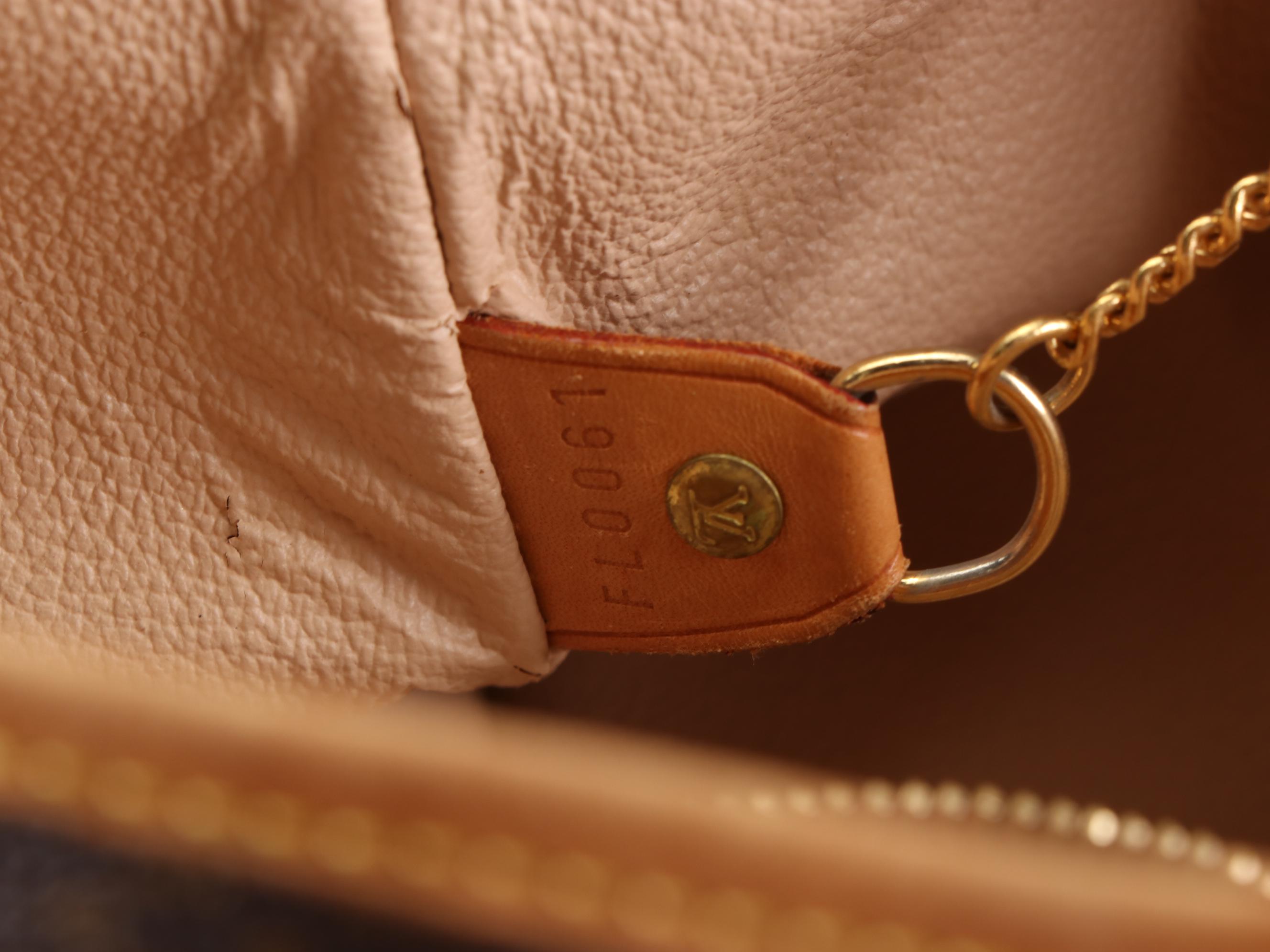 Louis Vuitton Bucket Bag GM and Zip Pouch in Monogram Canvas