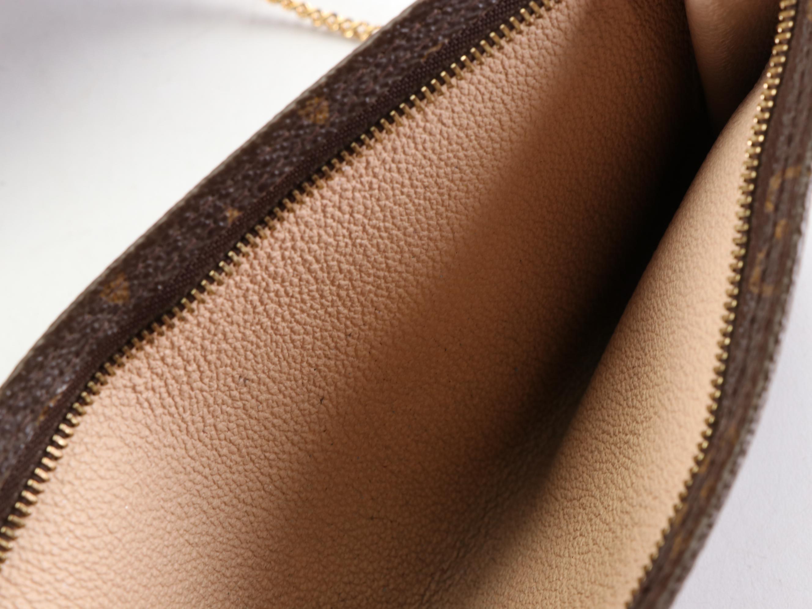 Louis Vuitton Bucket Bag GM and Zip Pouch in Monogram Canvas