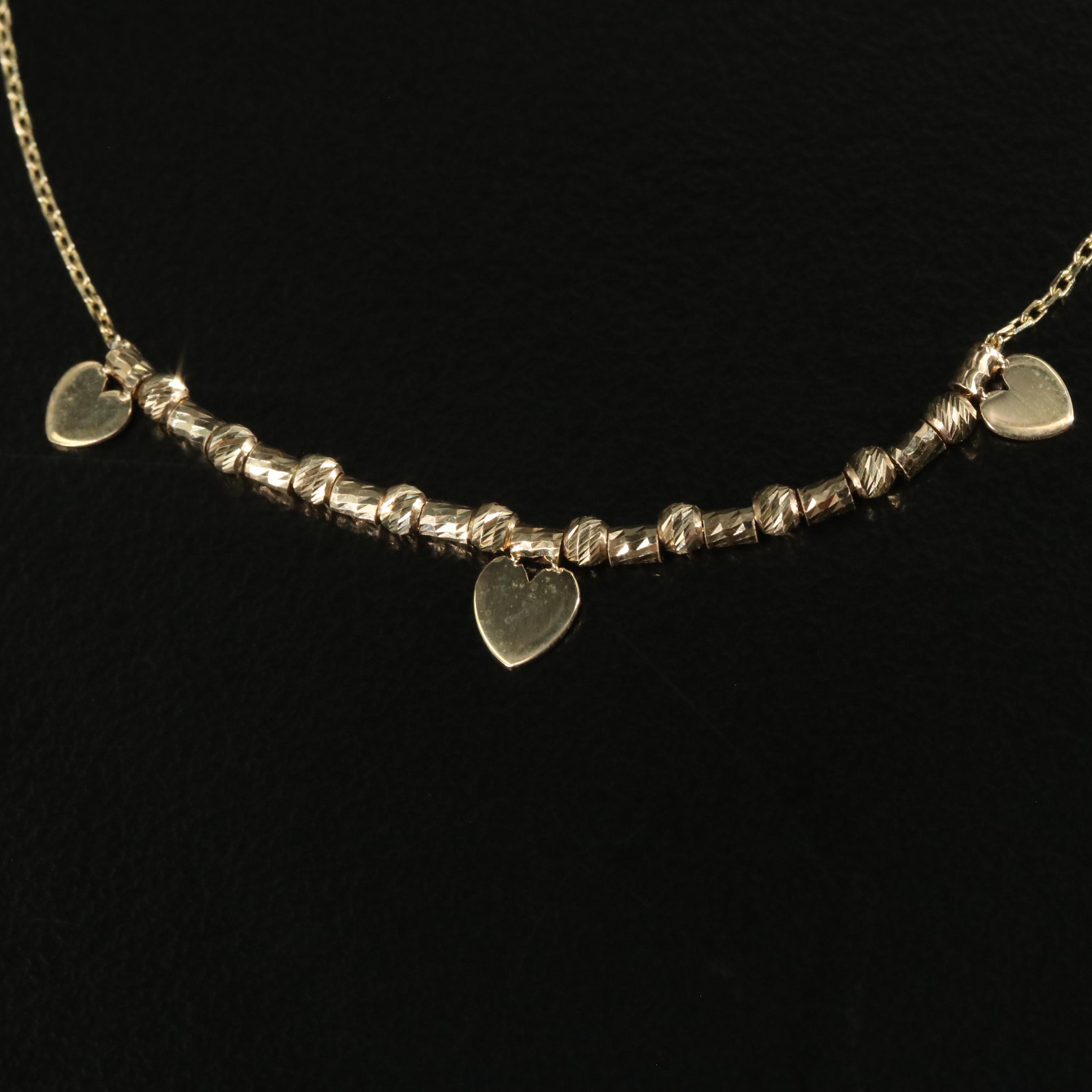 14K Dangling Hearts Bracelet