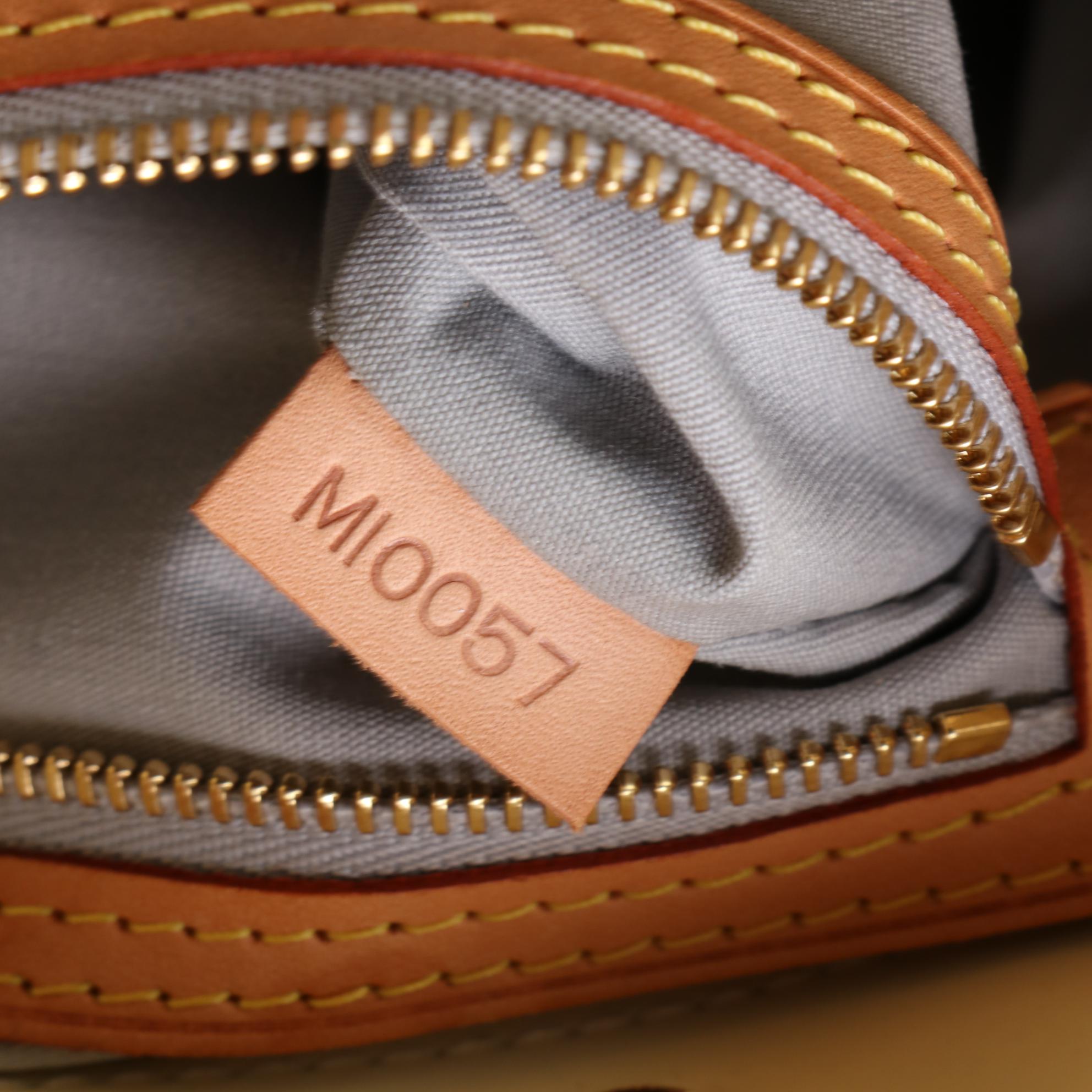 Louis Vuitton Reade PM in Monogram Vernis and Vachetta Leather