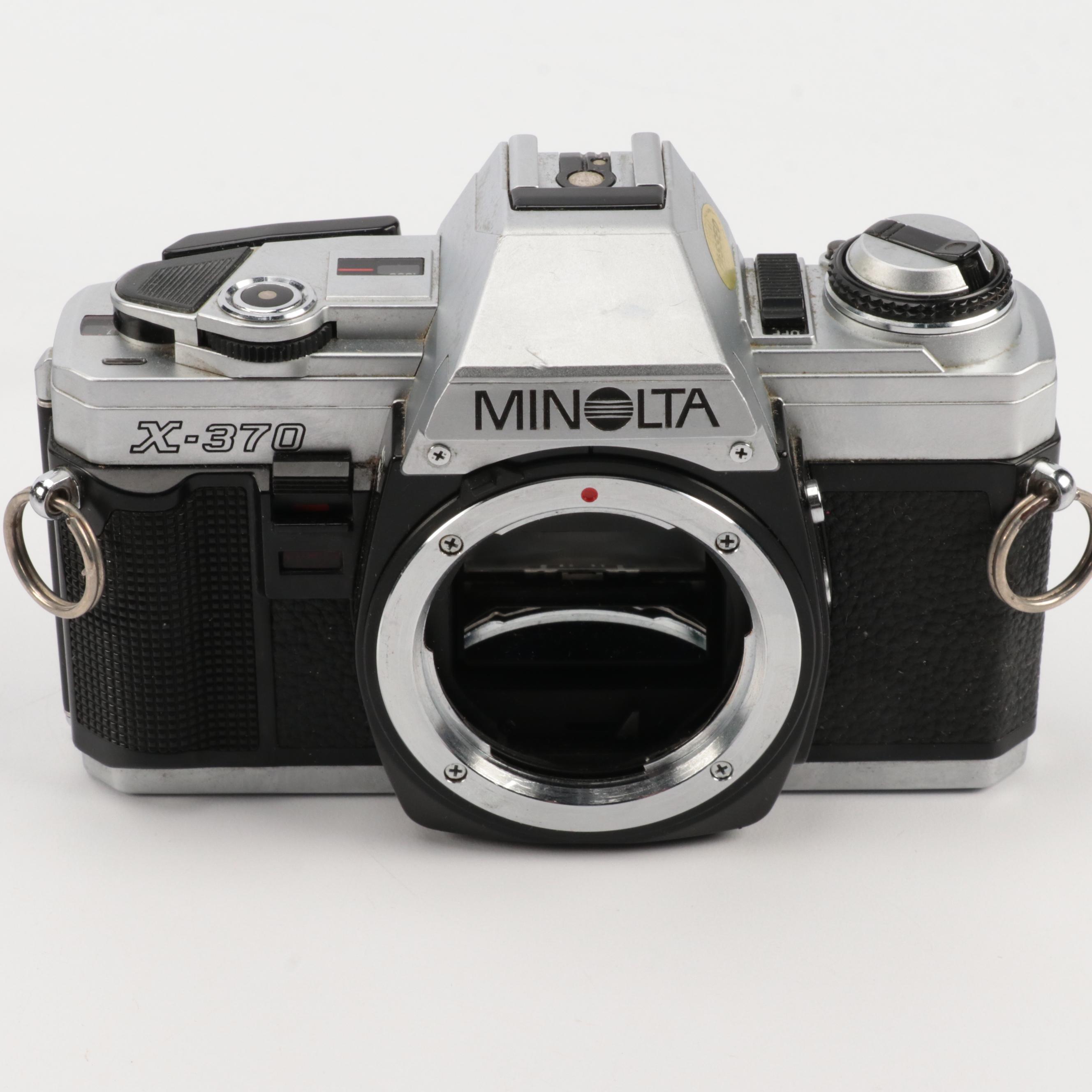 Minolta X-370 and XG7 SLR Cameras with Lenses