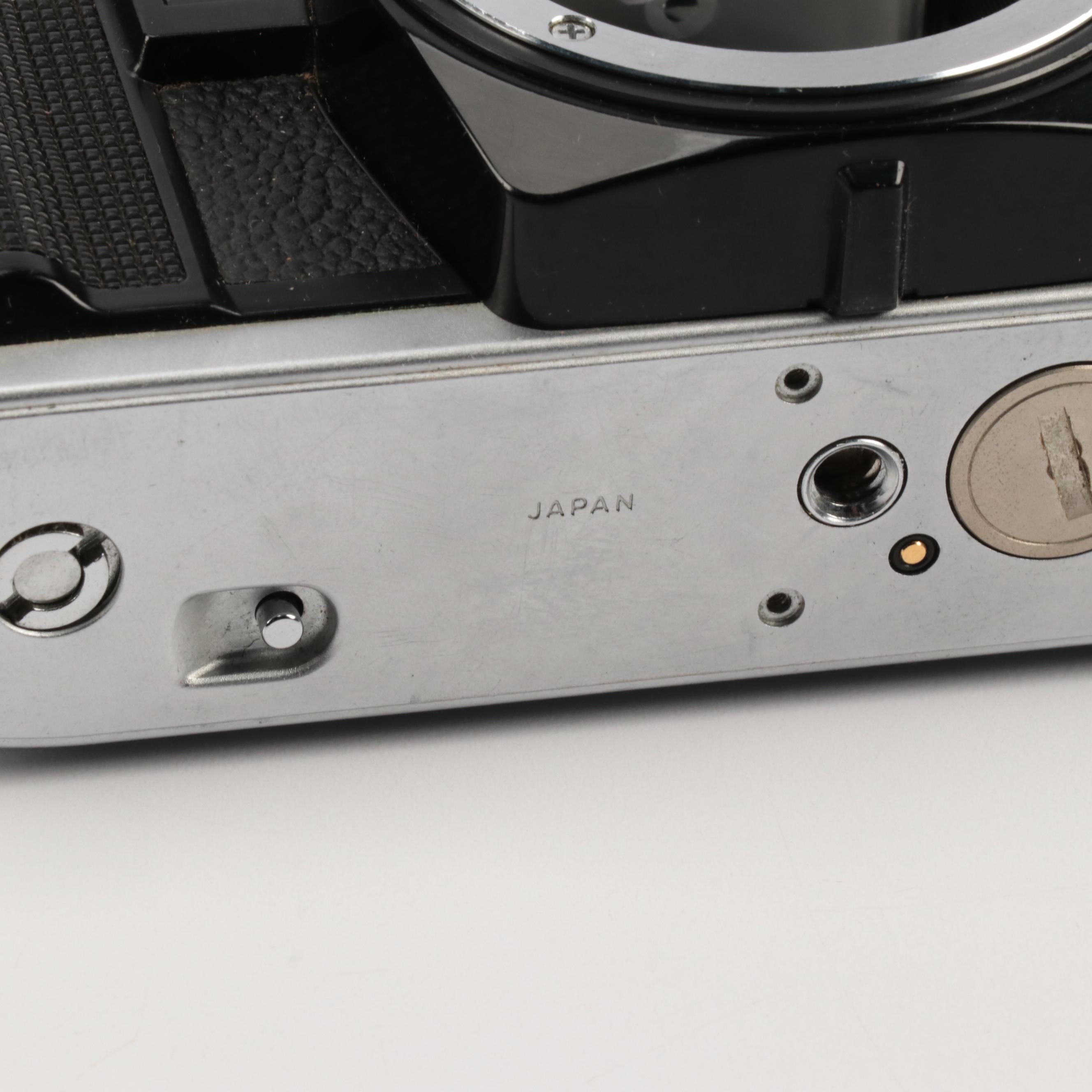 Minolta X-370 and XG7 SLR Cameras with Lenses