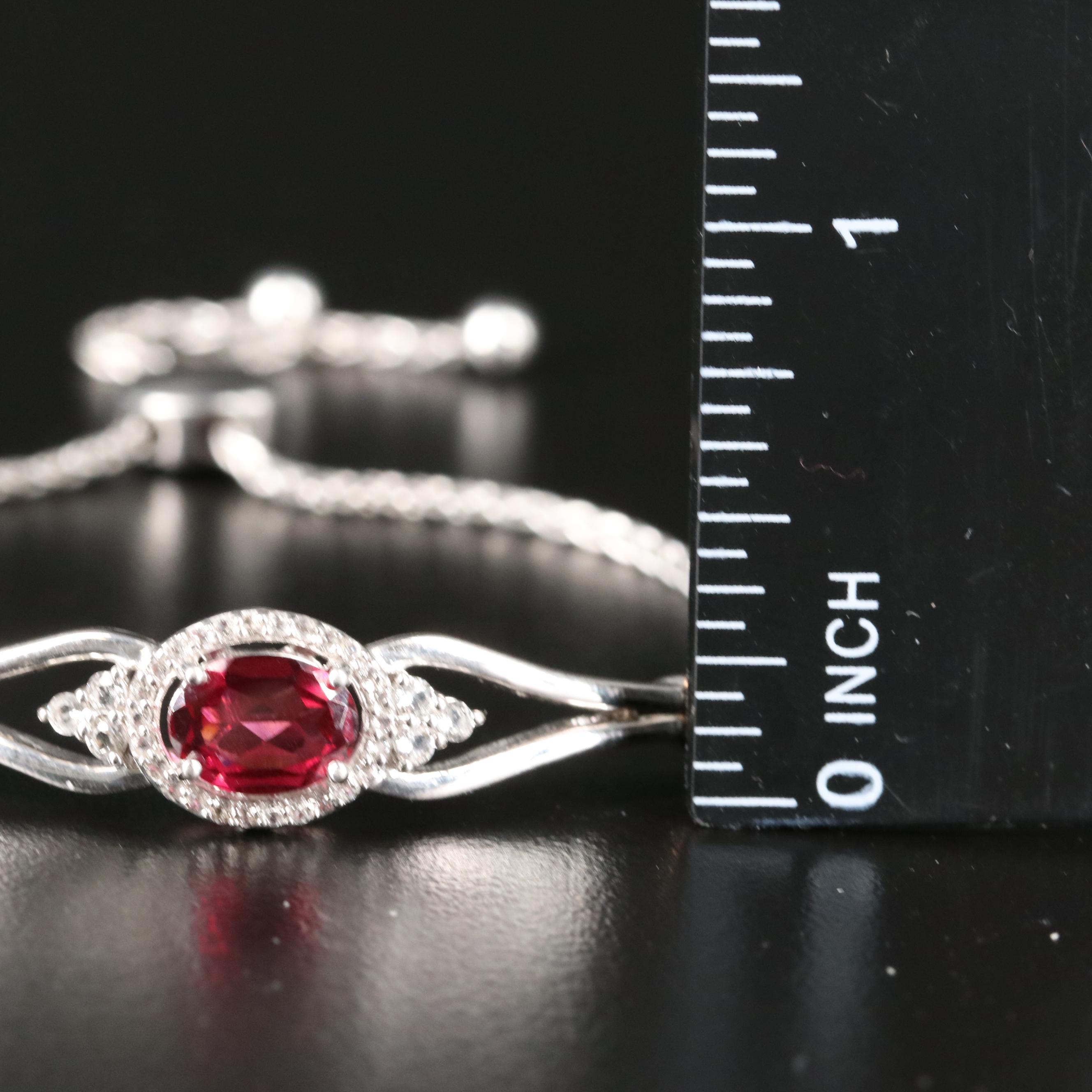 Sterling Garnet and Topaz Bolo Bracelet with 10K Rose Gold Accent