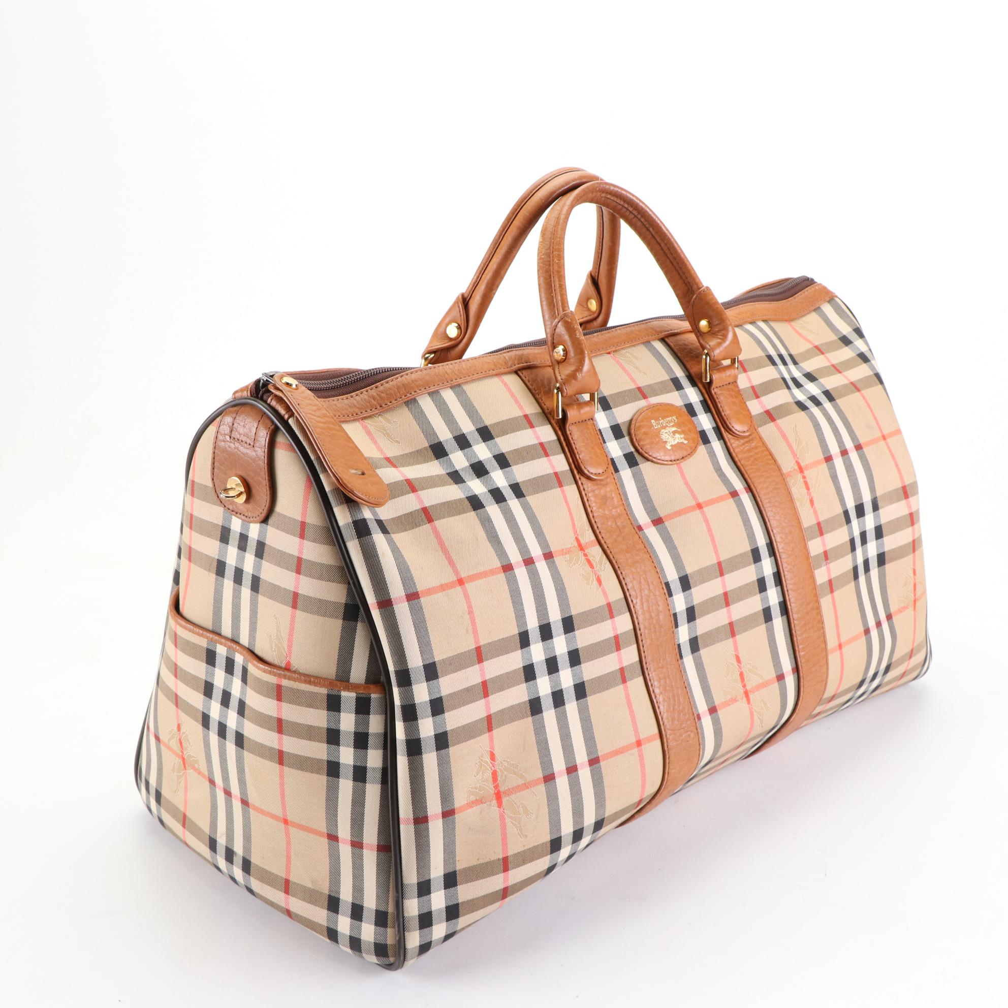 Burberrys Duffle Bag in "Haymarket Check" Canvas and Grained Leather
