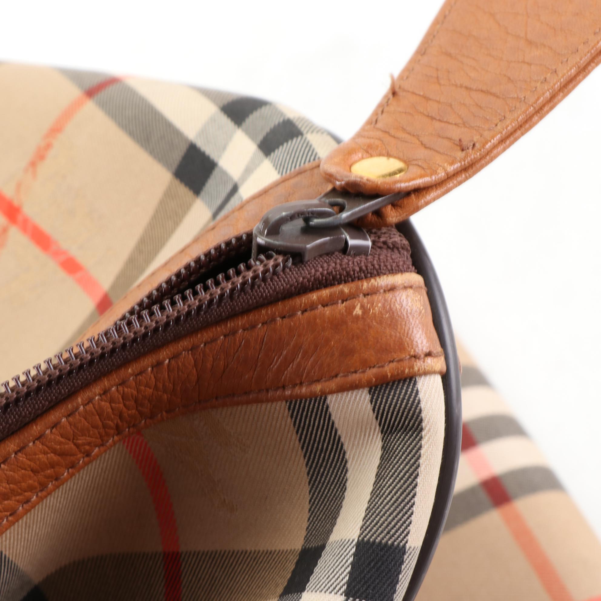 Burberrys Duffle Bag in "Haymarket Check" Canvas and Grained Leather