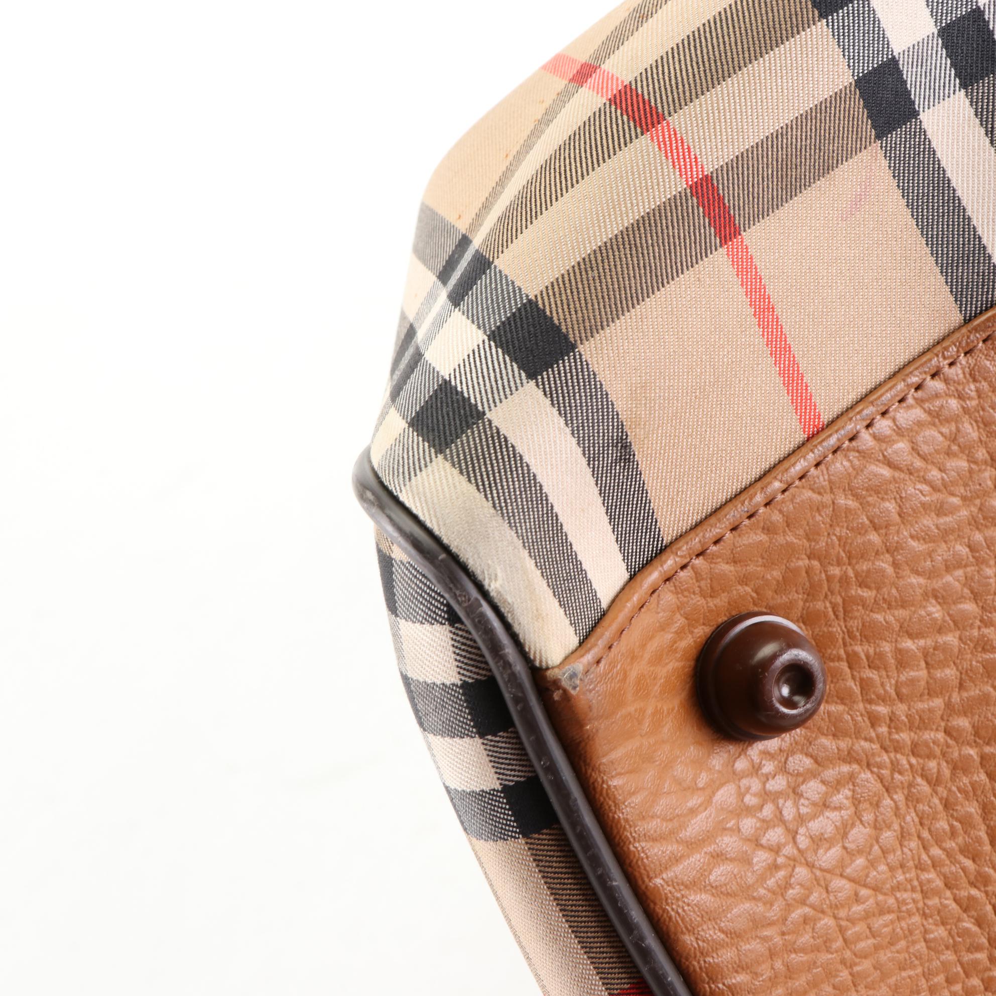 Burberrys Duffle Bag in "Haymarket Check" Canvas and Grained Leather