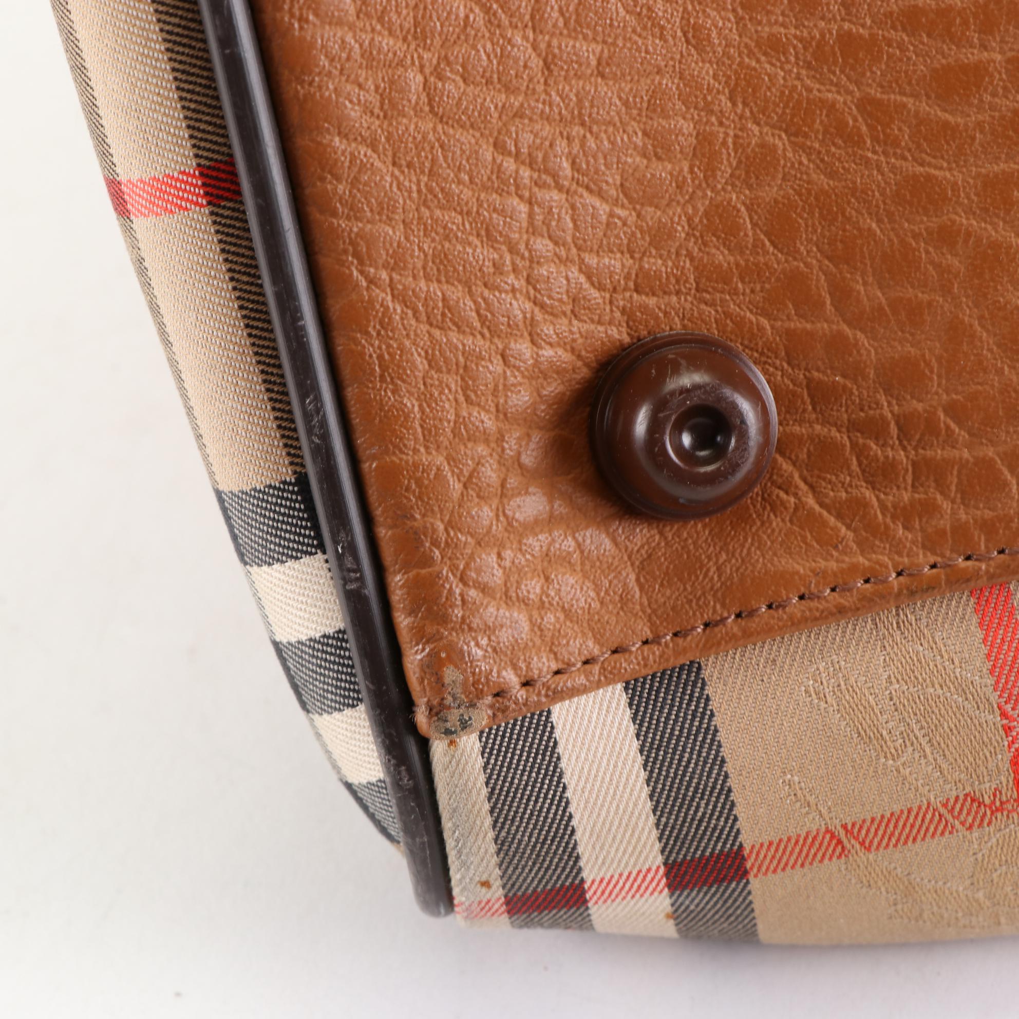 Burberrys Duffle Bag in "Haymarket Check" Canvas and Grained Leather