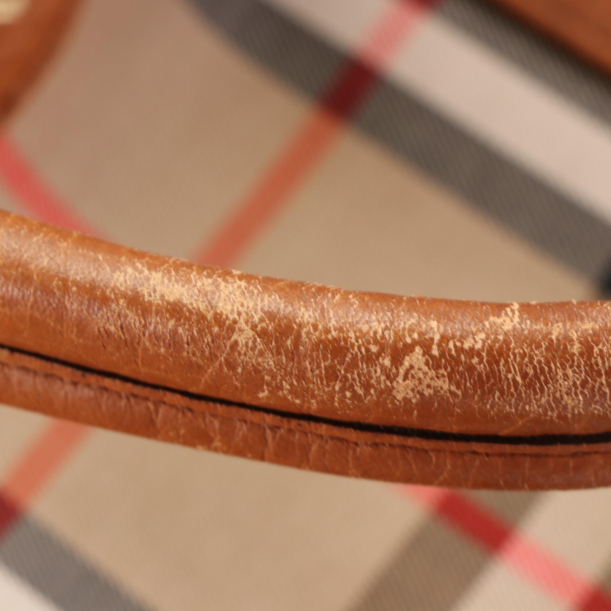 Burberrys Duffle Bag in "Haymarket Check" Canvas and Grained Leather