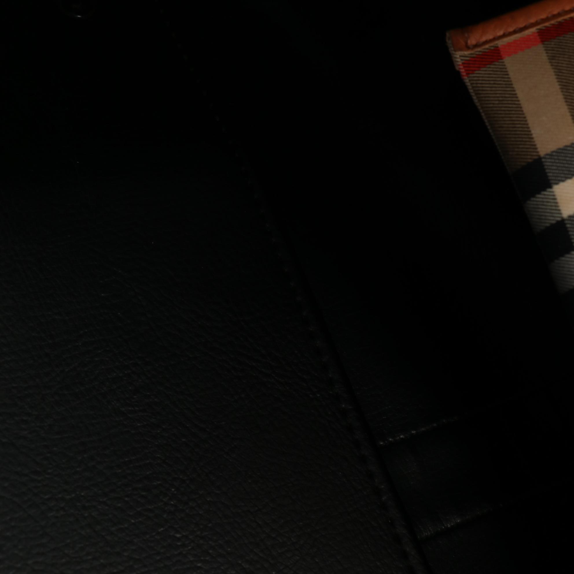 Burberrys Duffle Bag in "Haymarket Check" Canvas and Grained Leather