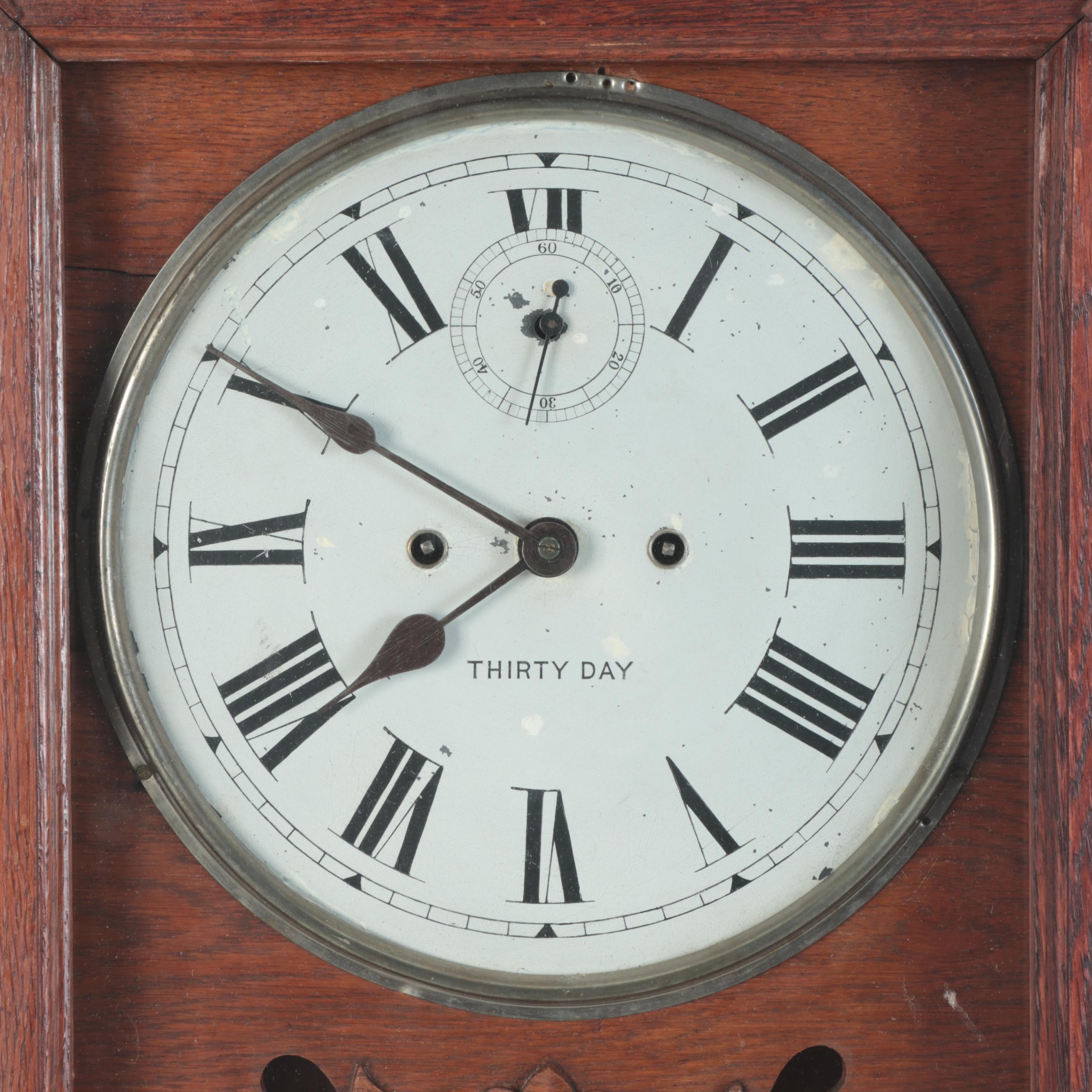 New Haven Clock Co. Eastlake Style Oak Wood Wall Clock, Late 19th Century