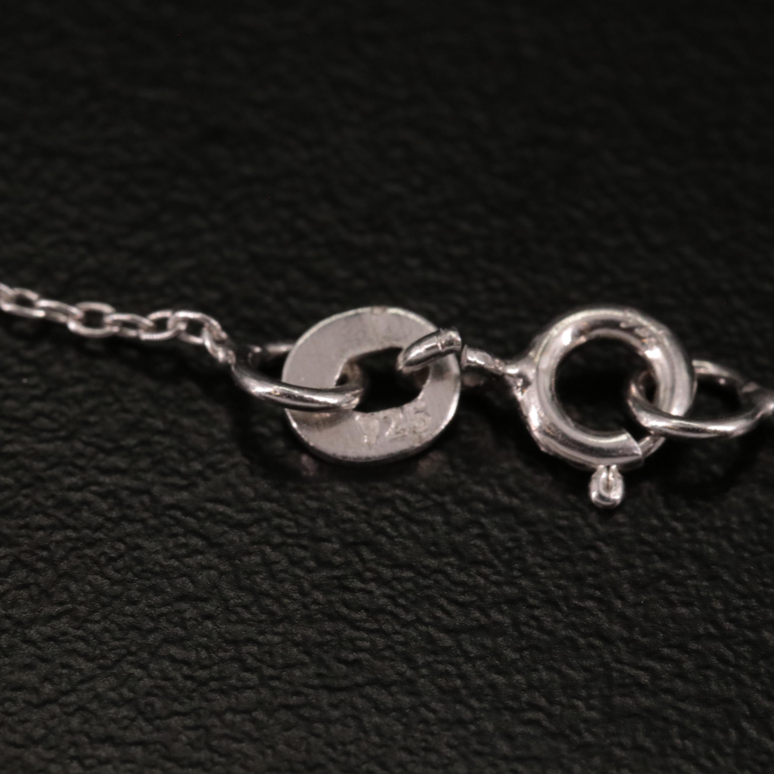 Sterling Cubic Zirconia Ribbon Pendant Necklace