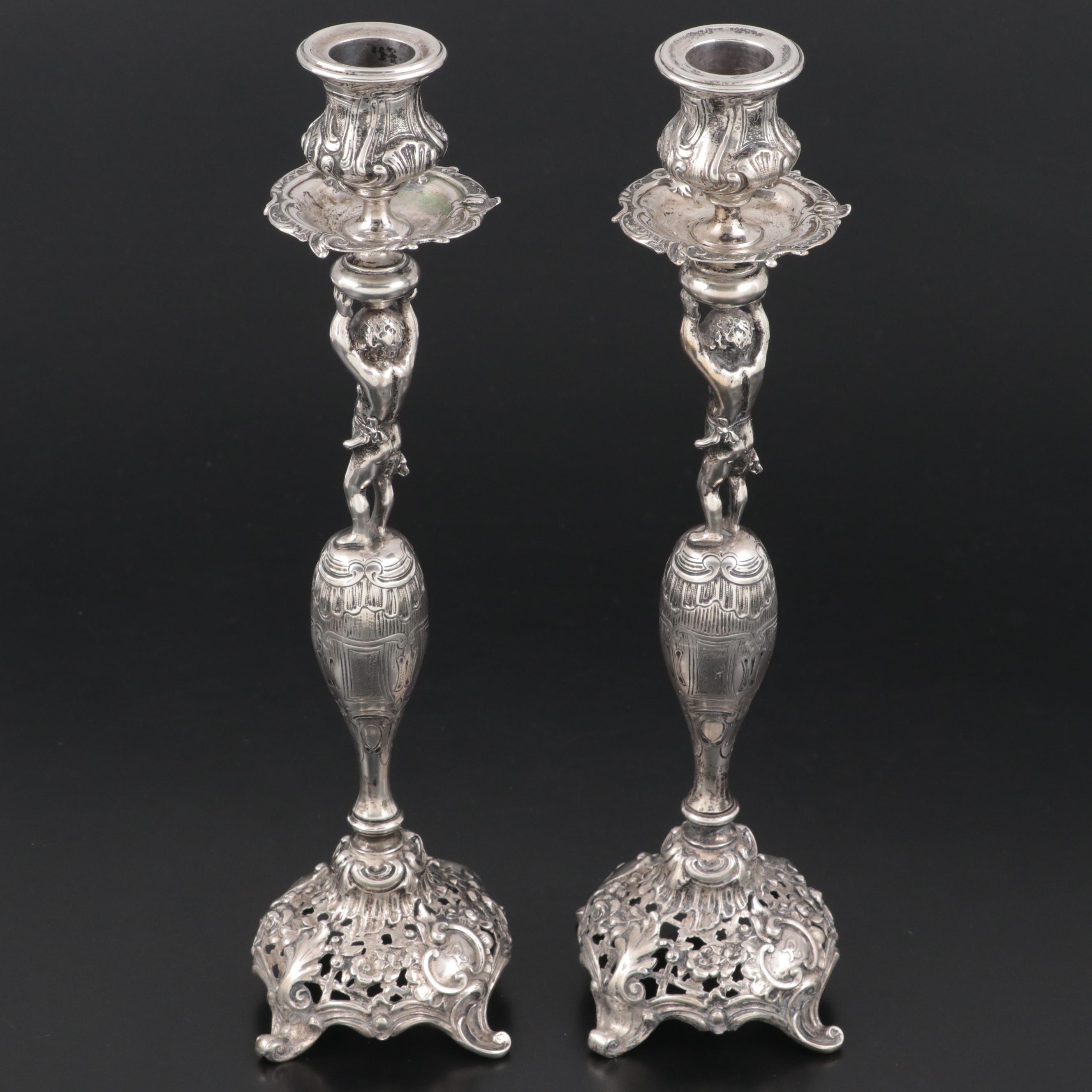 Pair of German 800 Silver Figural Candlesticks