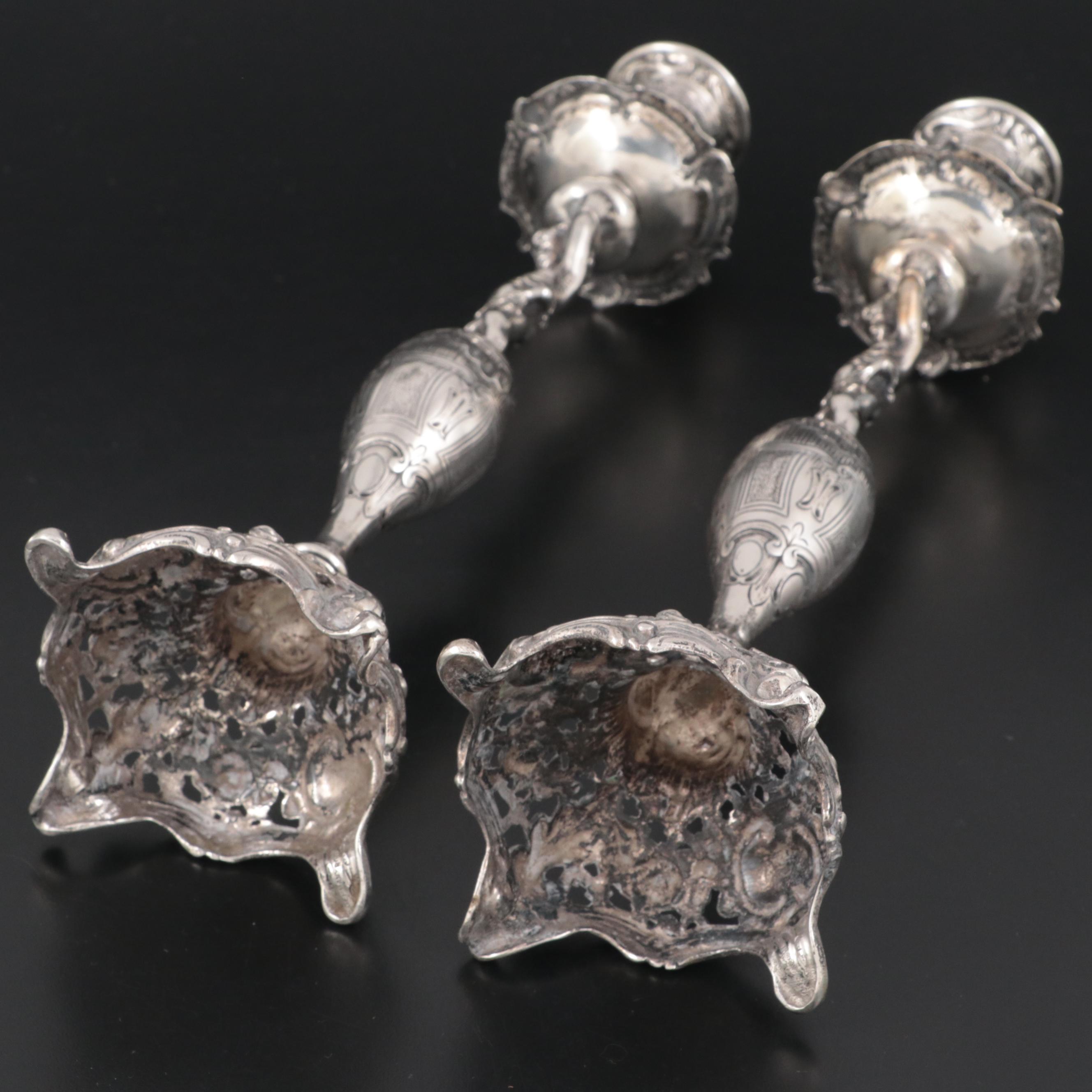 Pair of German 800 Silver Figural Candlesticks