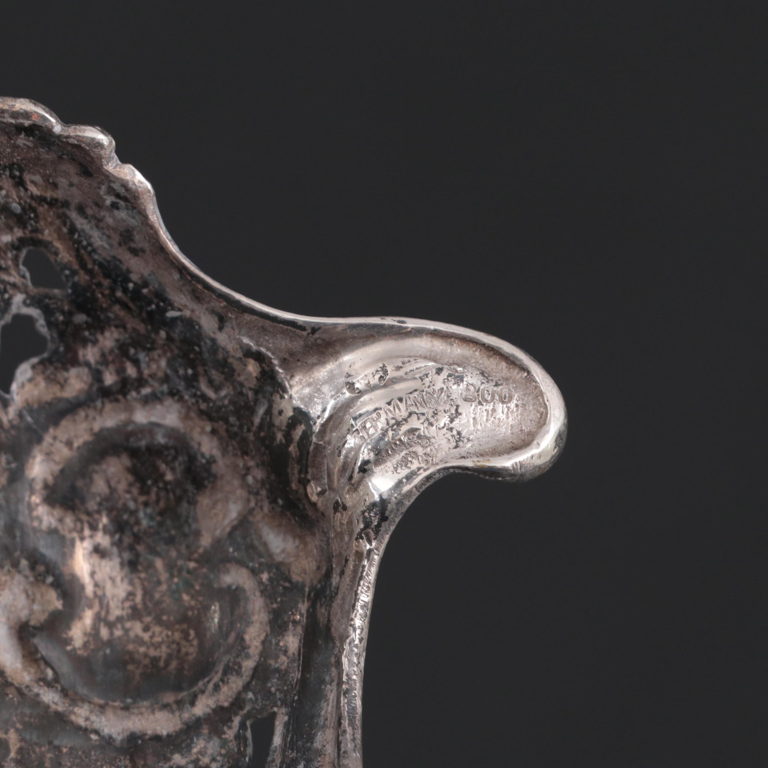 Pair of German 800 Silver Figural Candlesticks