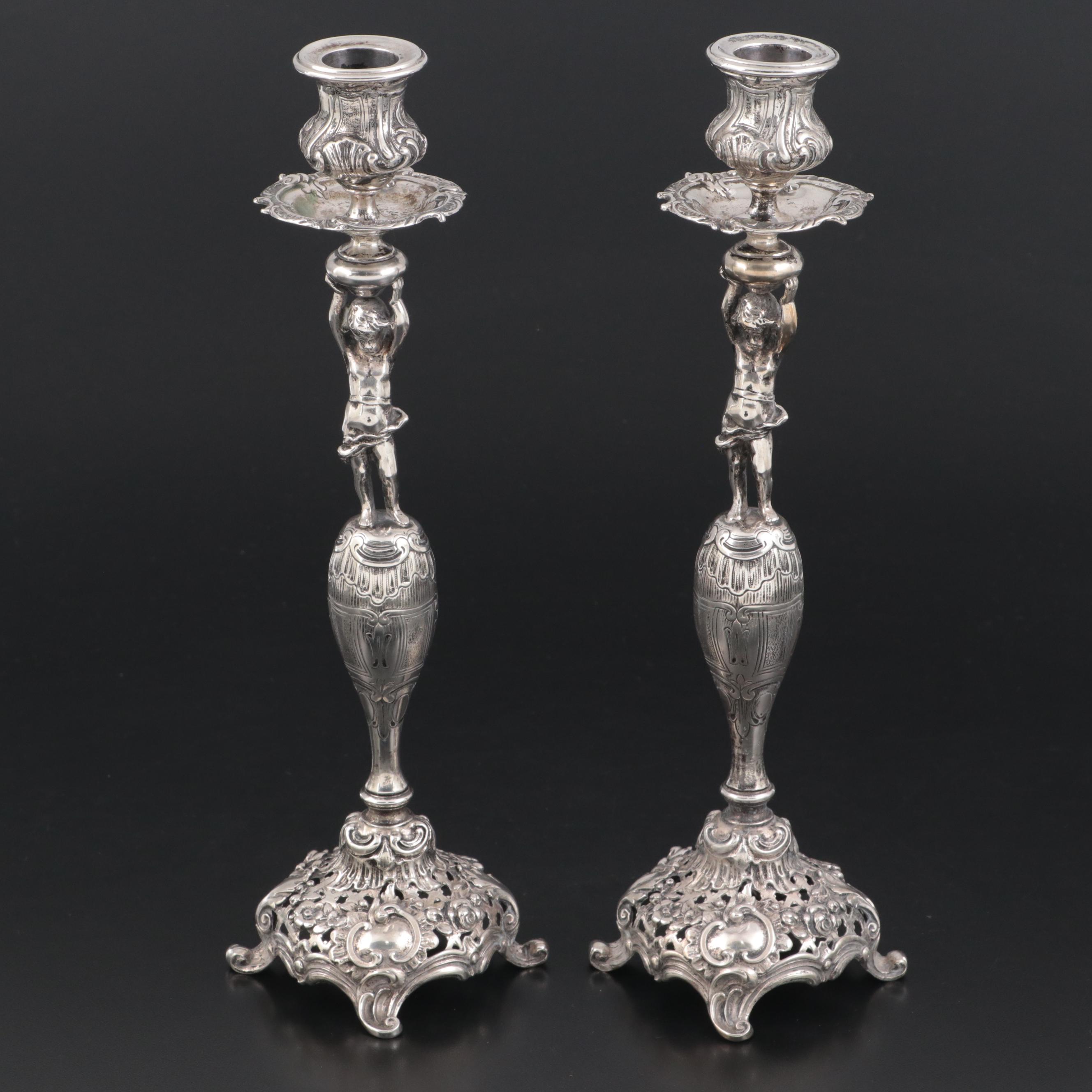 Pair of German 800 Silver Figural Candlesticks