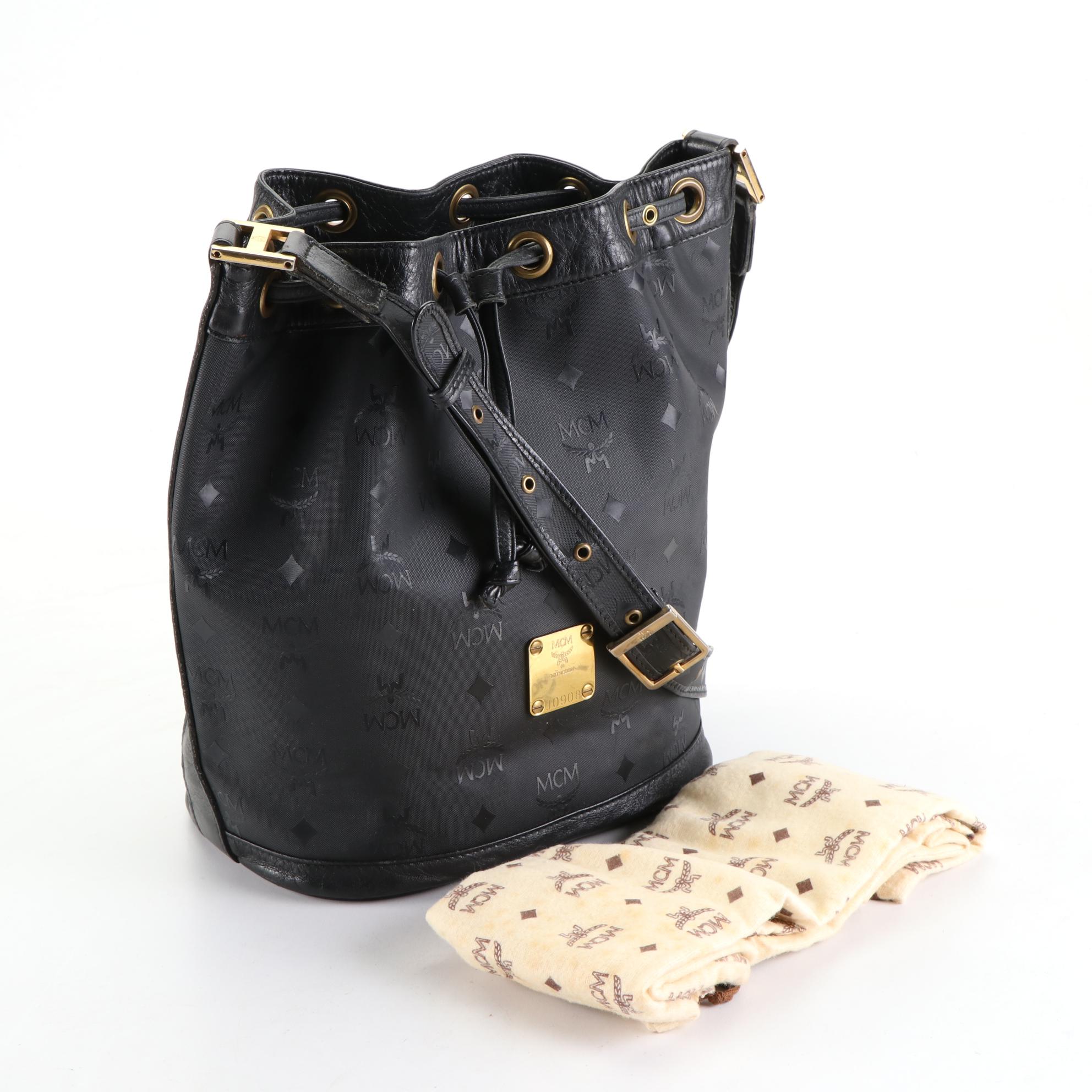 MCM Drawstring Bucket Bag in Black Visetos and Leather