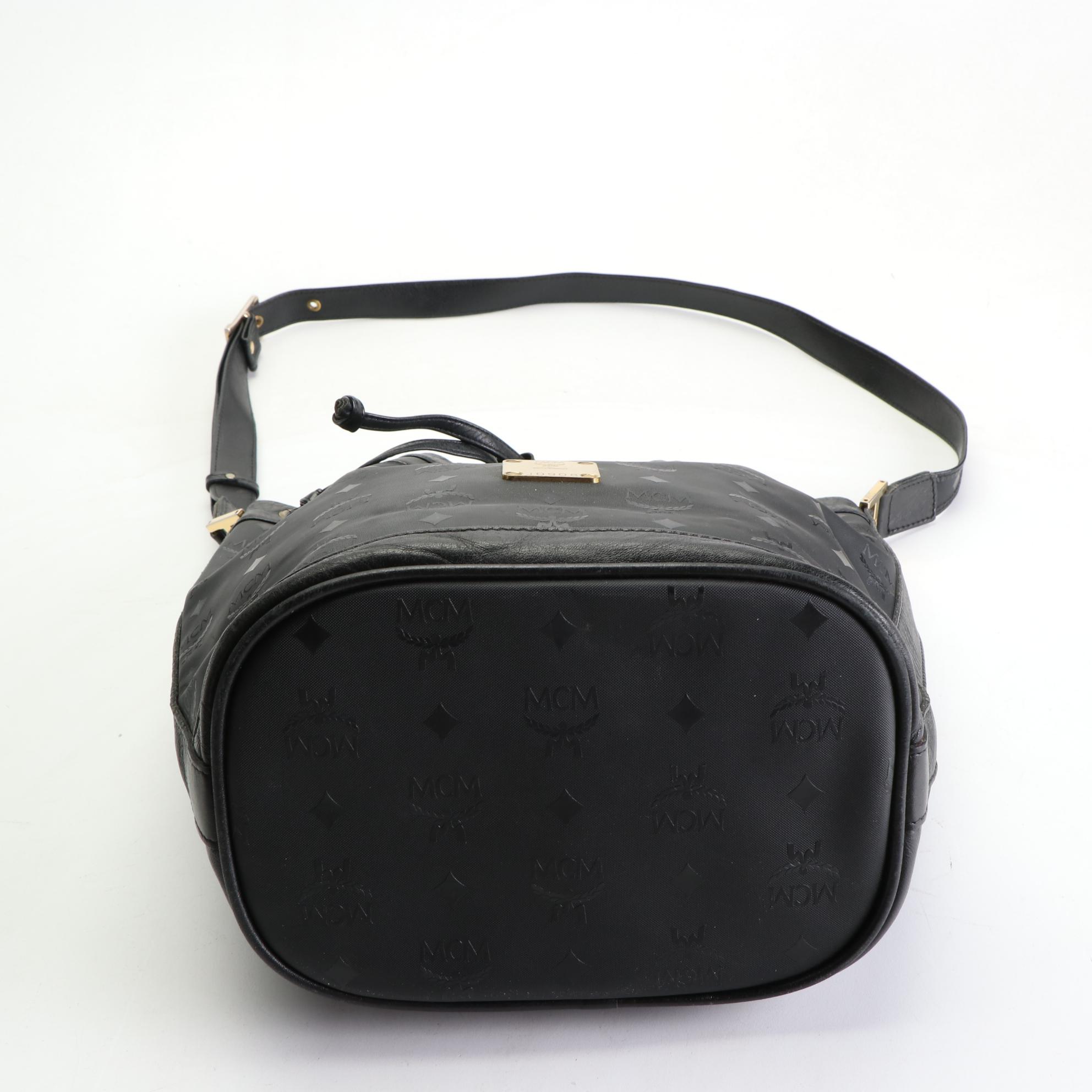 MCM Drawstring Bucket Bag in Black Visetos and Leather