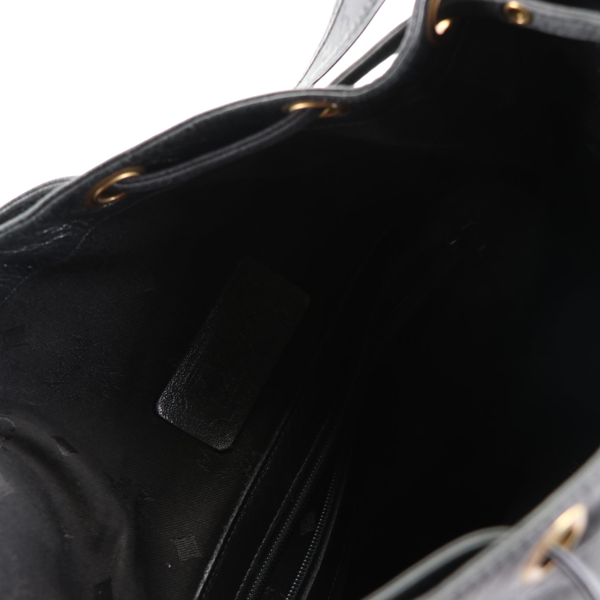 MCM Drawstring Bucket Bag in Black Visetos and Leather