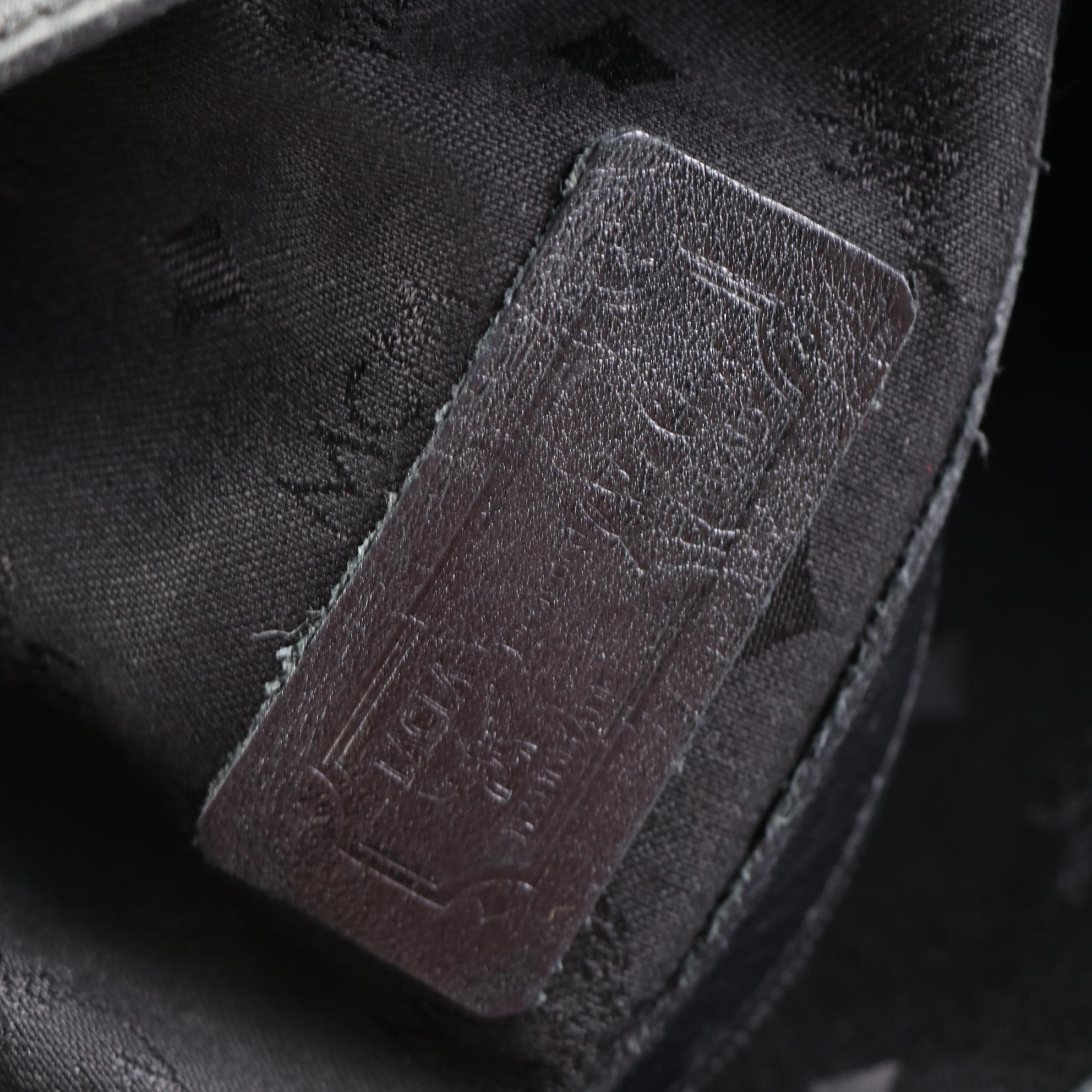 MCM Drawstring Bucket Bag in Black Visetos and Leather