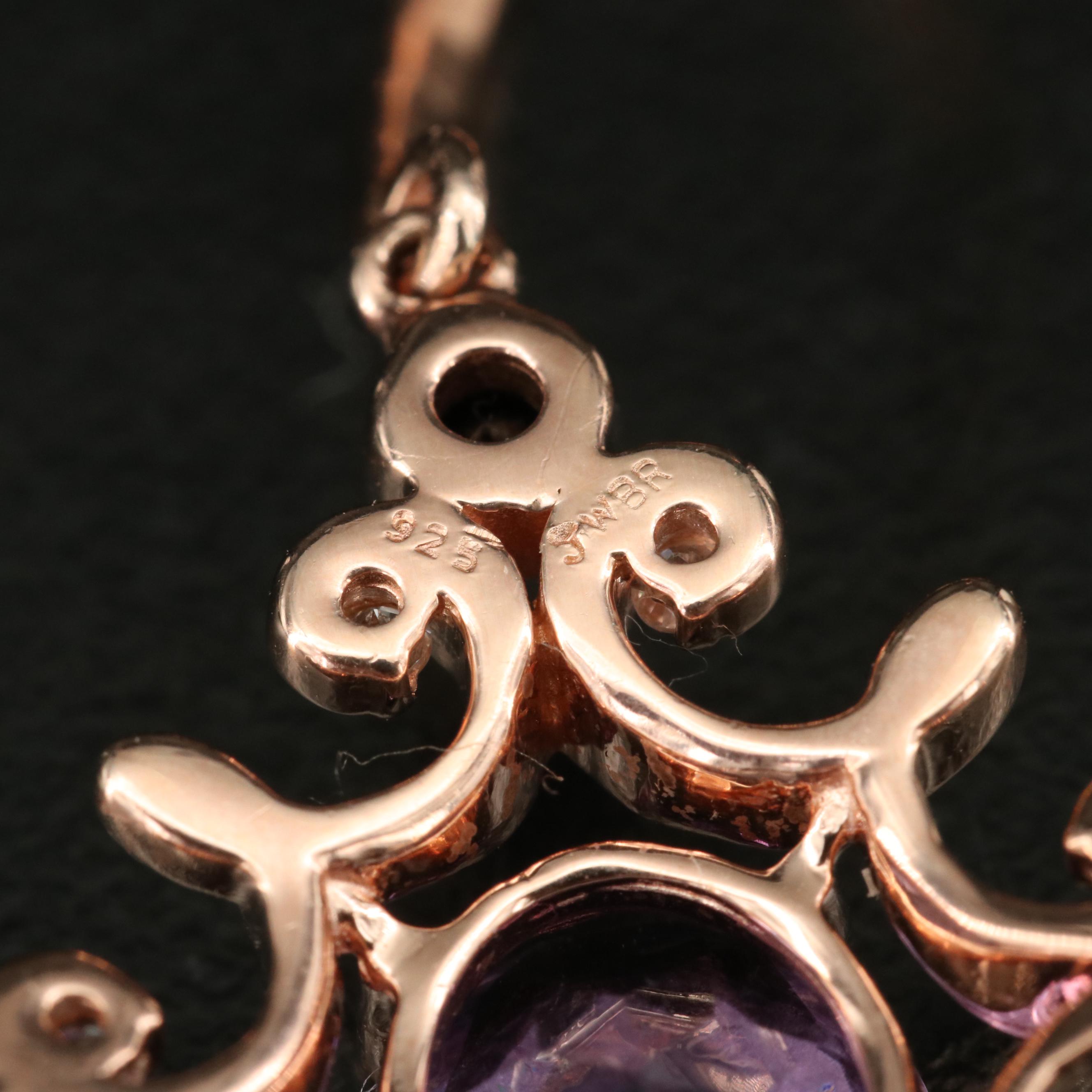 Sterling Amethyst and Zircon Scrollwork Earrings