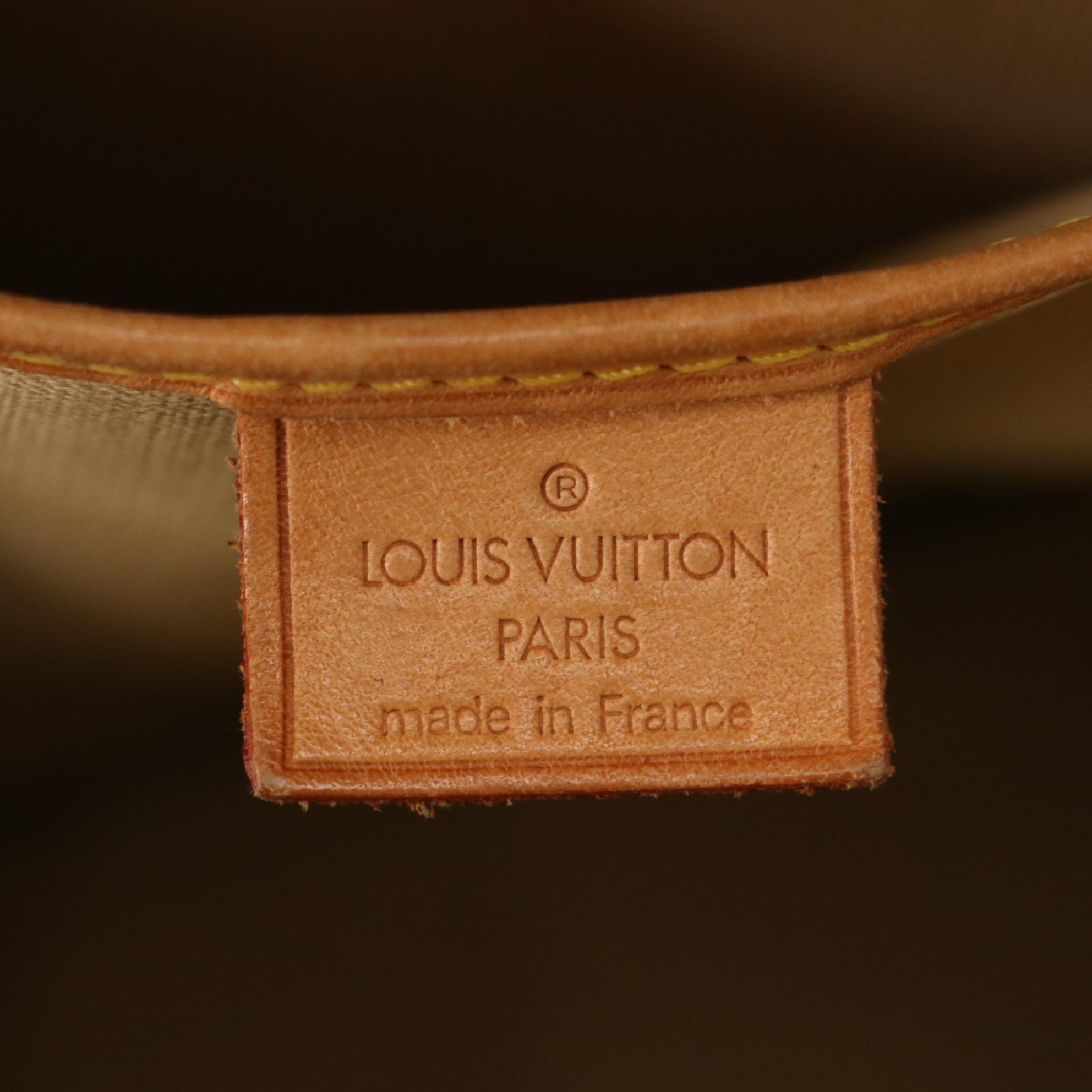 Louis Vuitton Excursion Shoe Bag in Monogram Canvas and Vachetta Leather