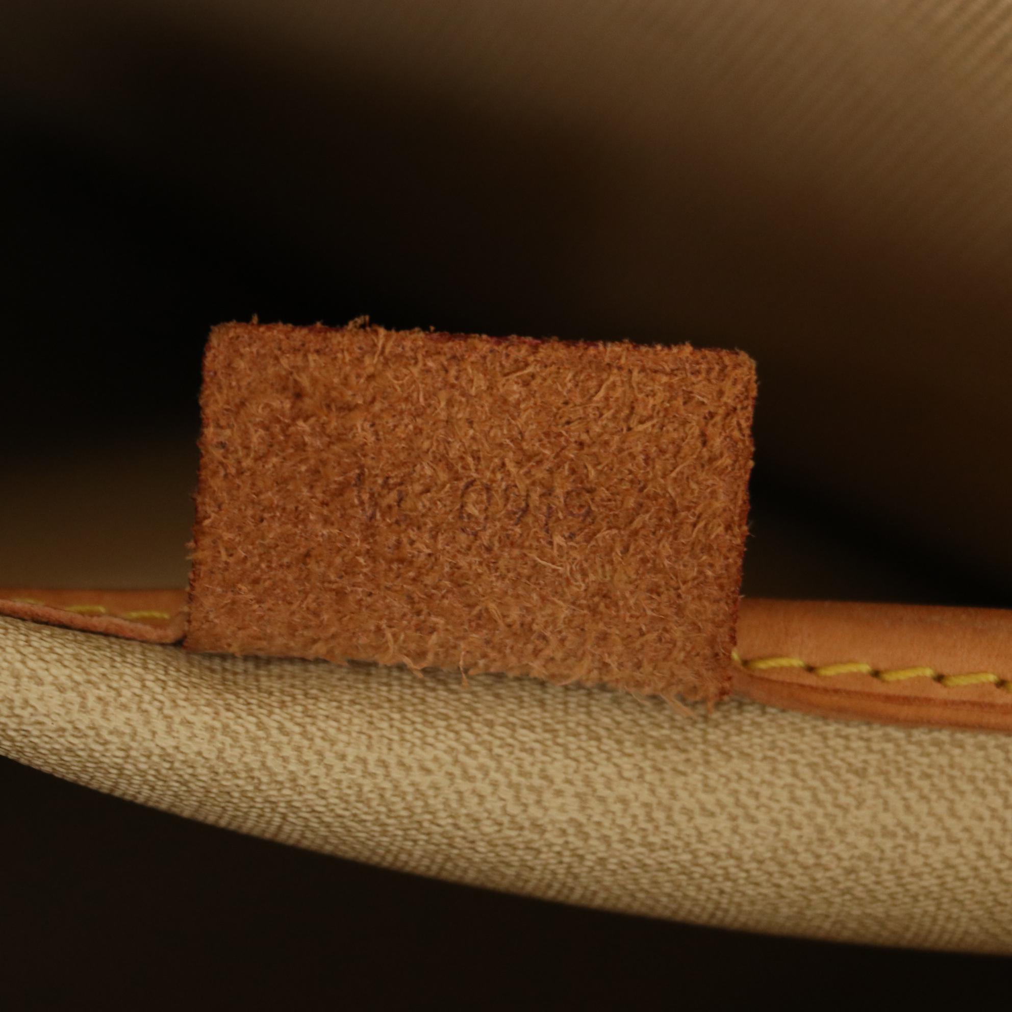 Louis Vuitton Excursion Shoe Bag in Monogram Canvas and Vachetta Leather