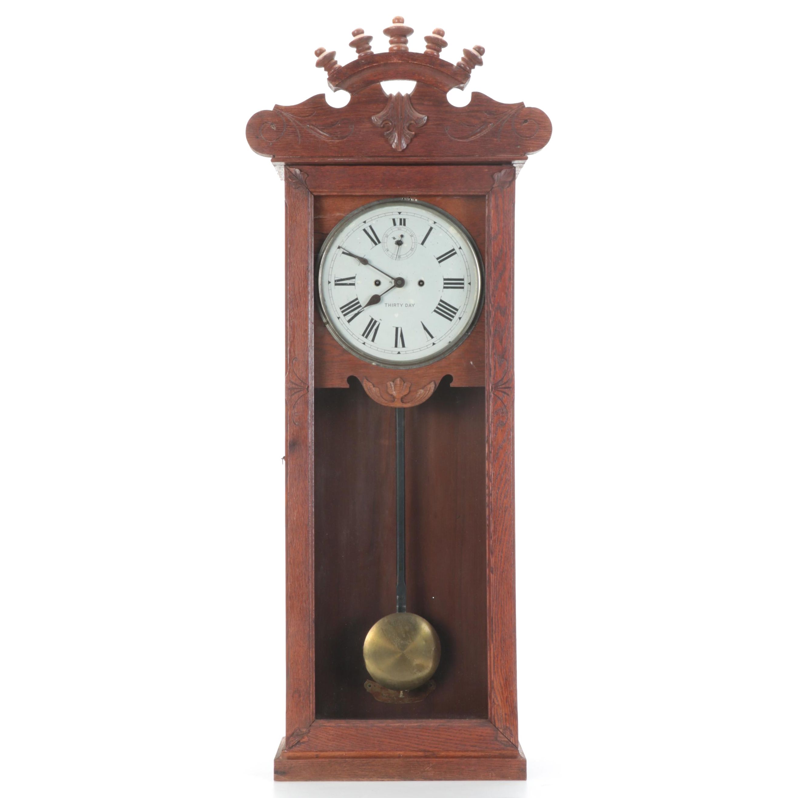 New Haven Clock Co. Eastlake Style Oak Wood Wall Clock, Late 19th Century