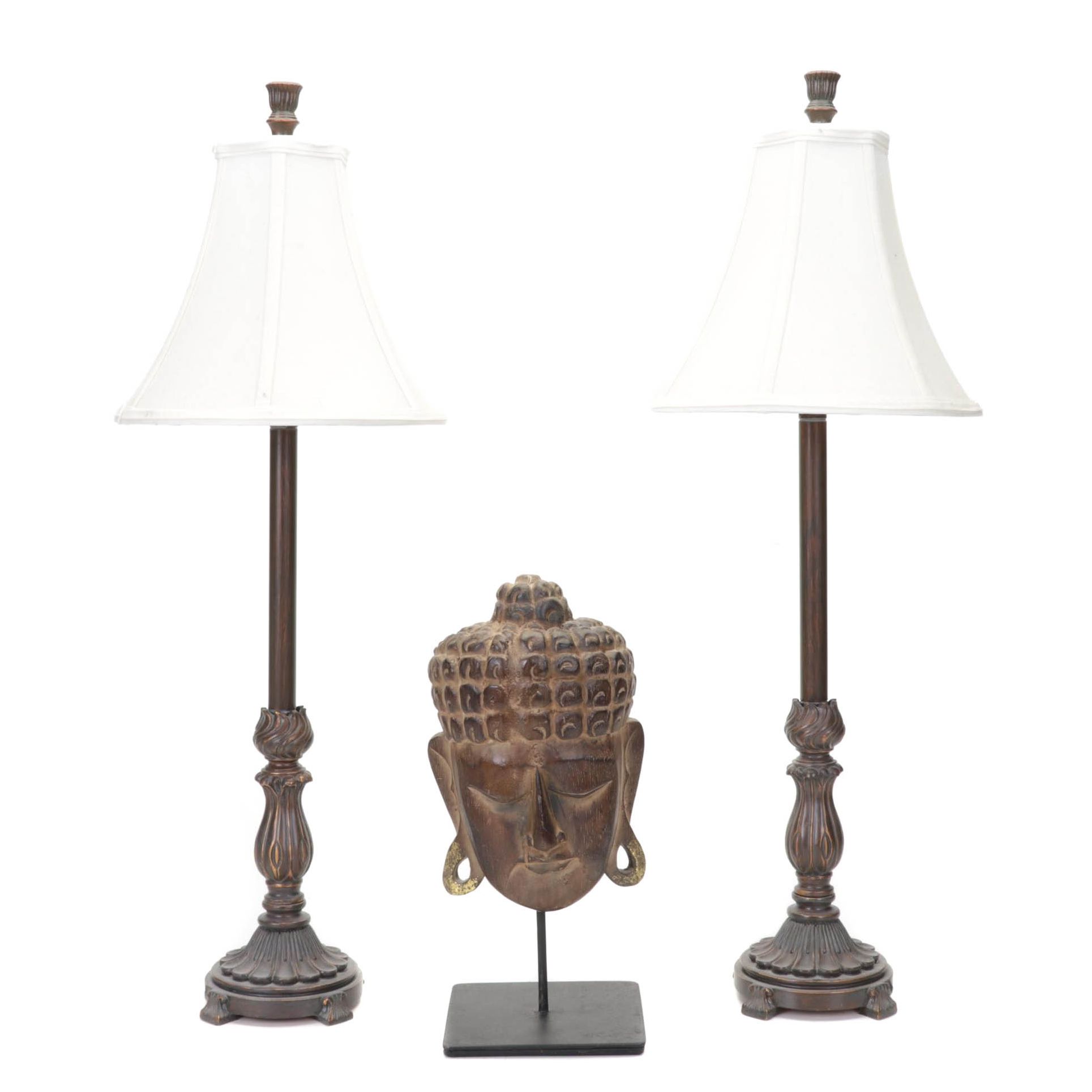 Pair of Bronzed Composite Candlestick Console Lamps With Carved Buddha Head
