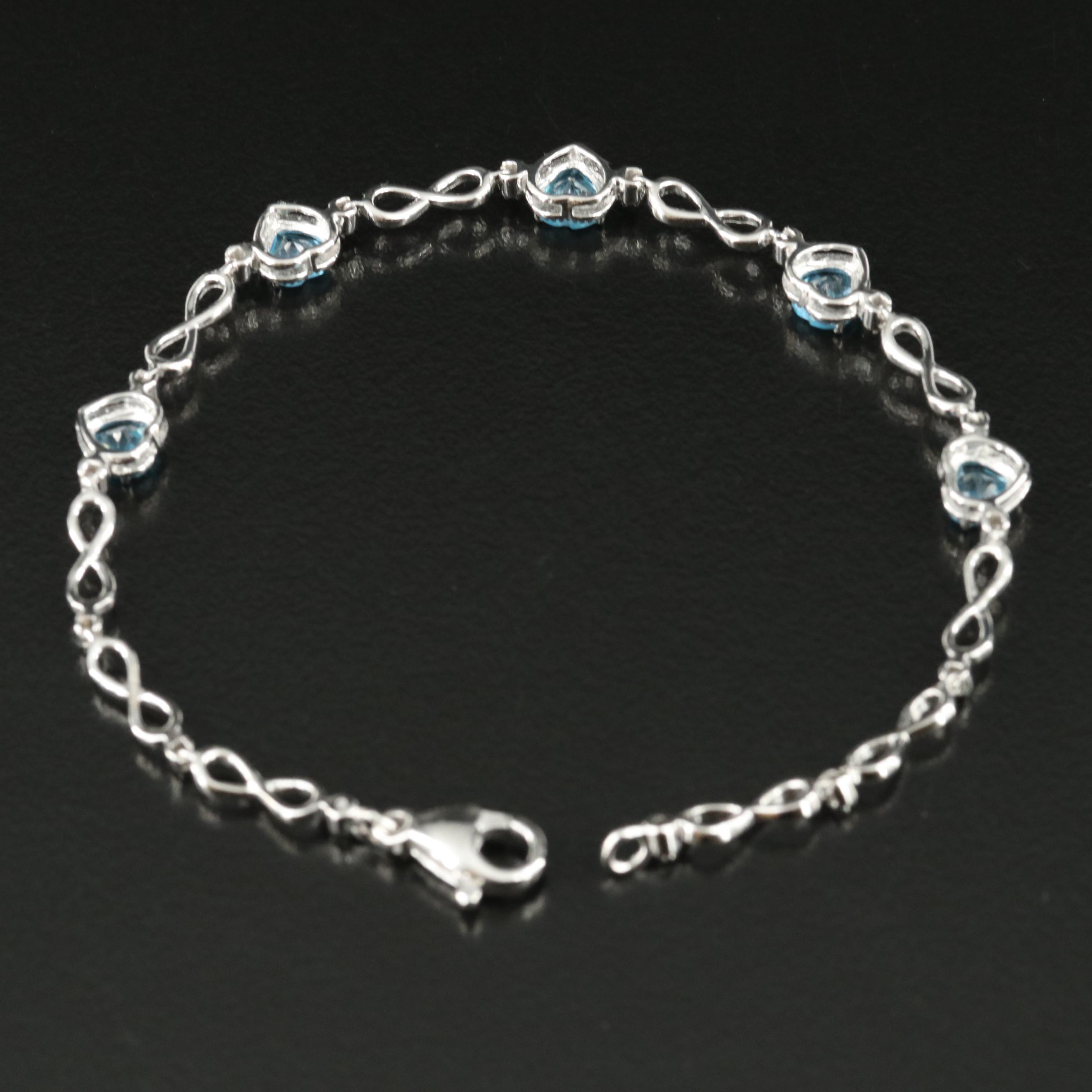 Sterling Swiss Blue Topaz Infinity and Heart Bracelet