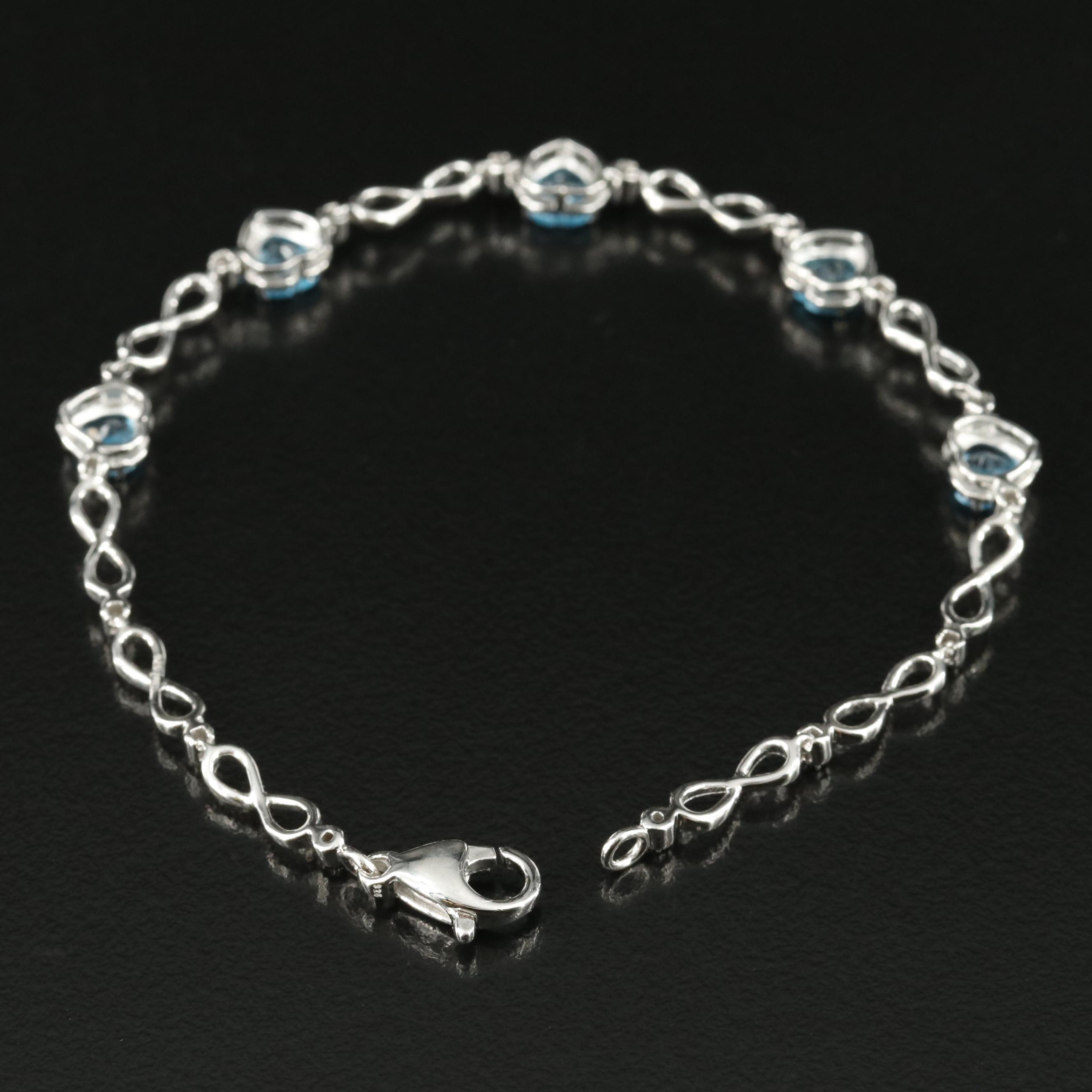 Sterling Swiss Blue Topaz Infinity and Heart Bracelet