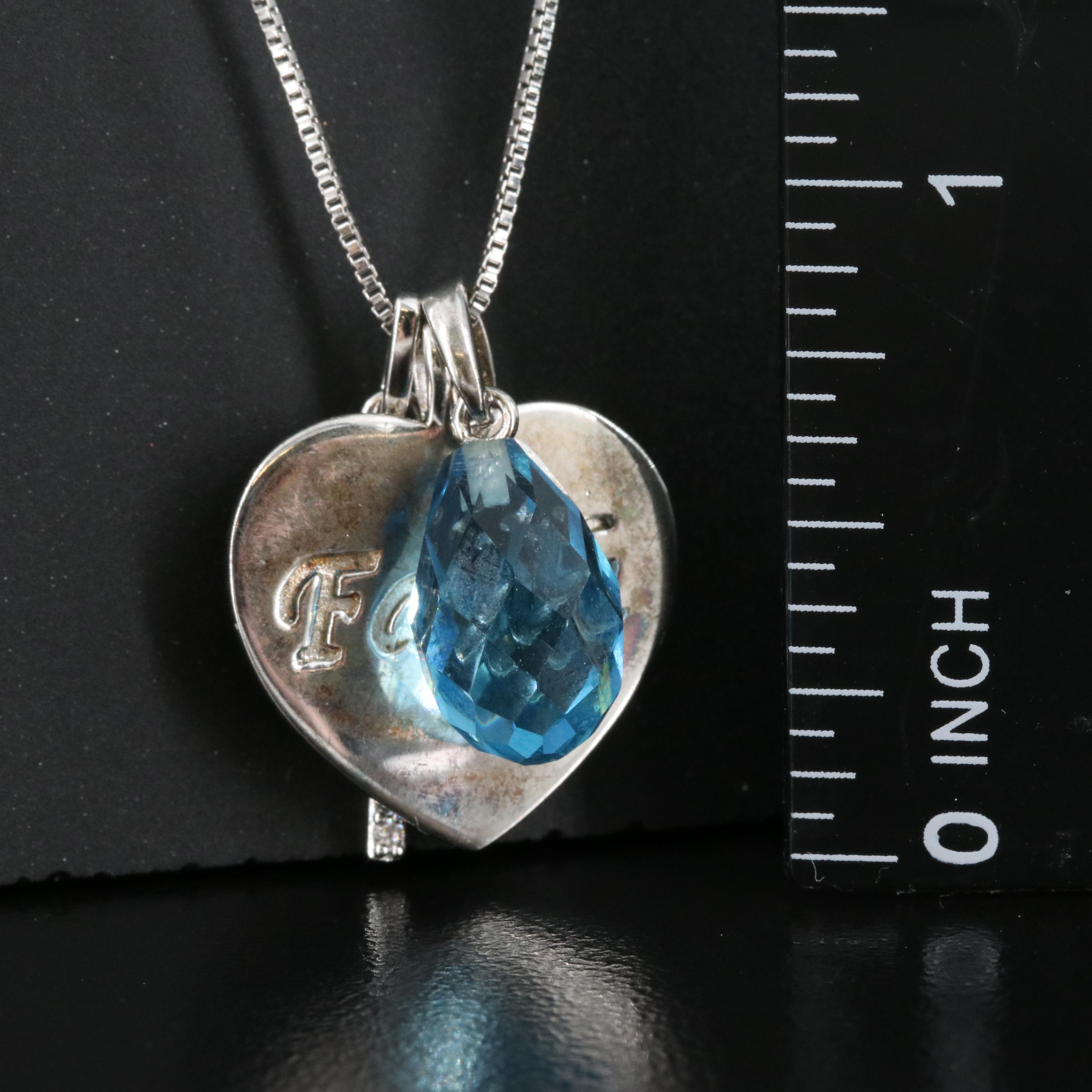 Sterling Topaz and Cubic Zirconia Cross and Faith Heart Pendant Necklace