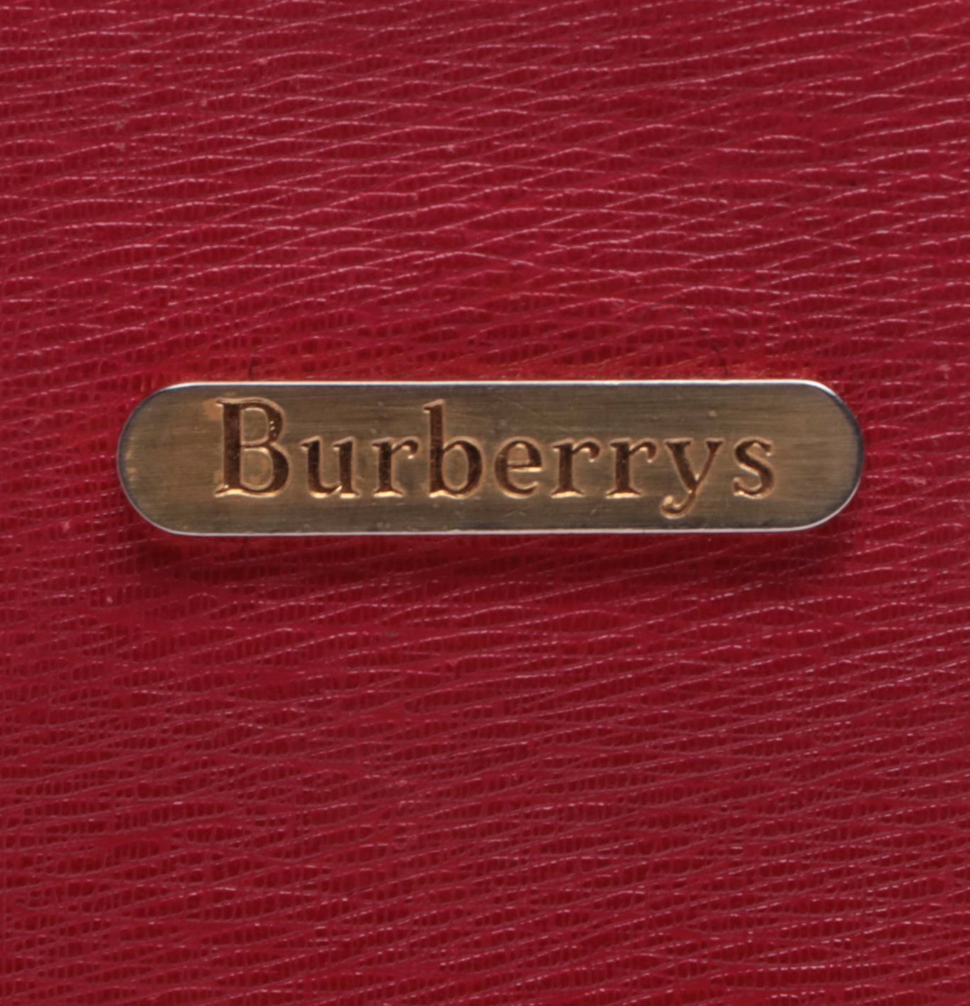 Burberrys Top Handle Handbag in Red Cross Grain Textured and Patent Leather