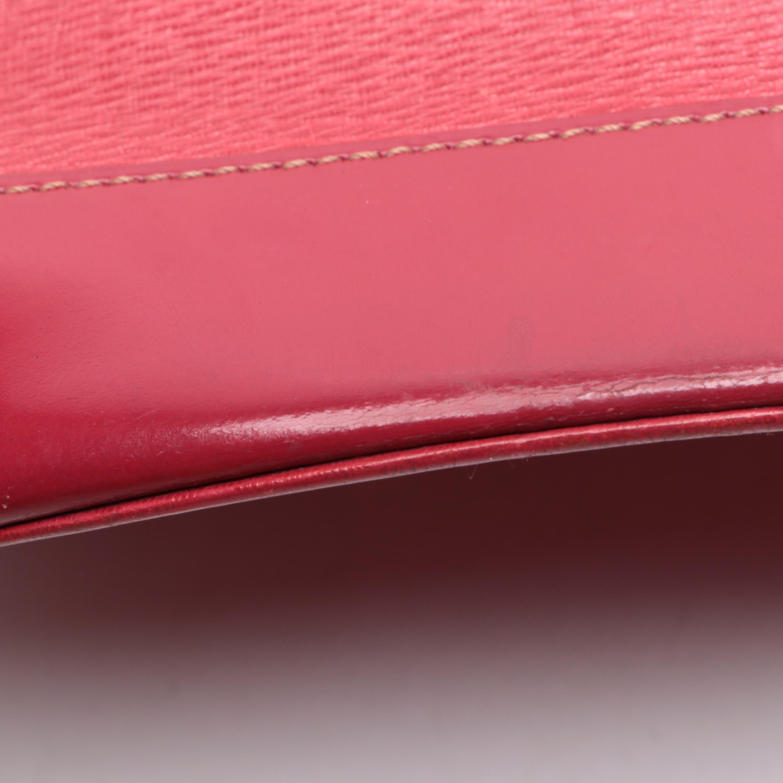 Burberrys Top Handle Handbag in Red Cross Grain Textured and Patent Leather