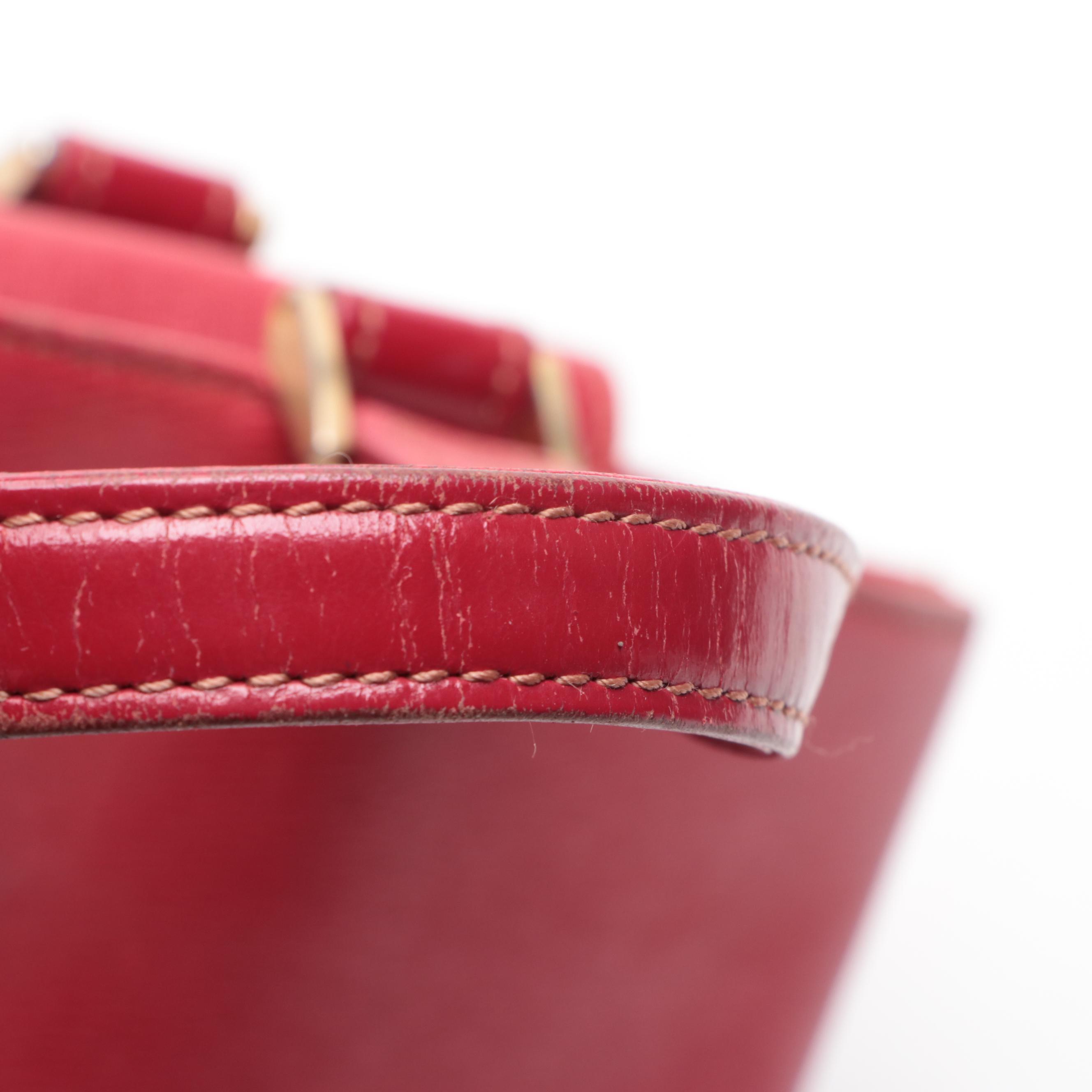 Burberrys Top Handle Handbag in Red Cross Grain Textured and Patent Leather