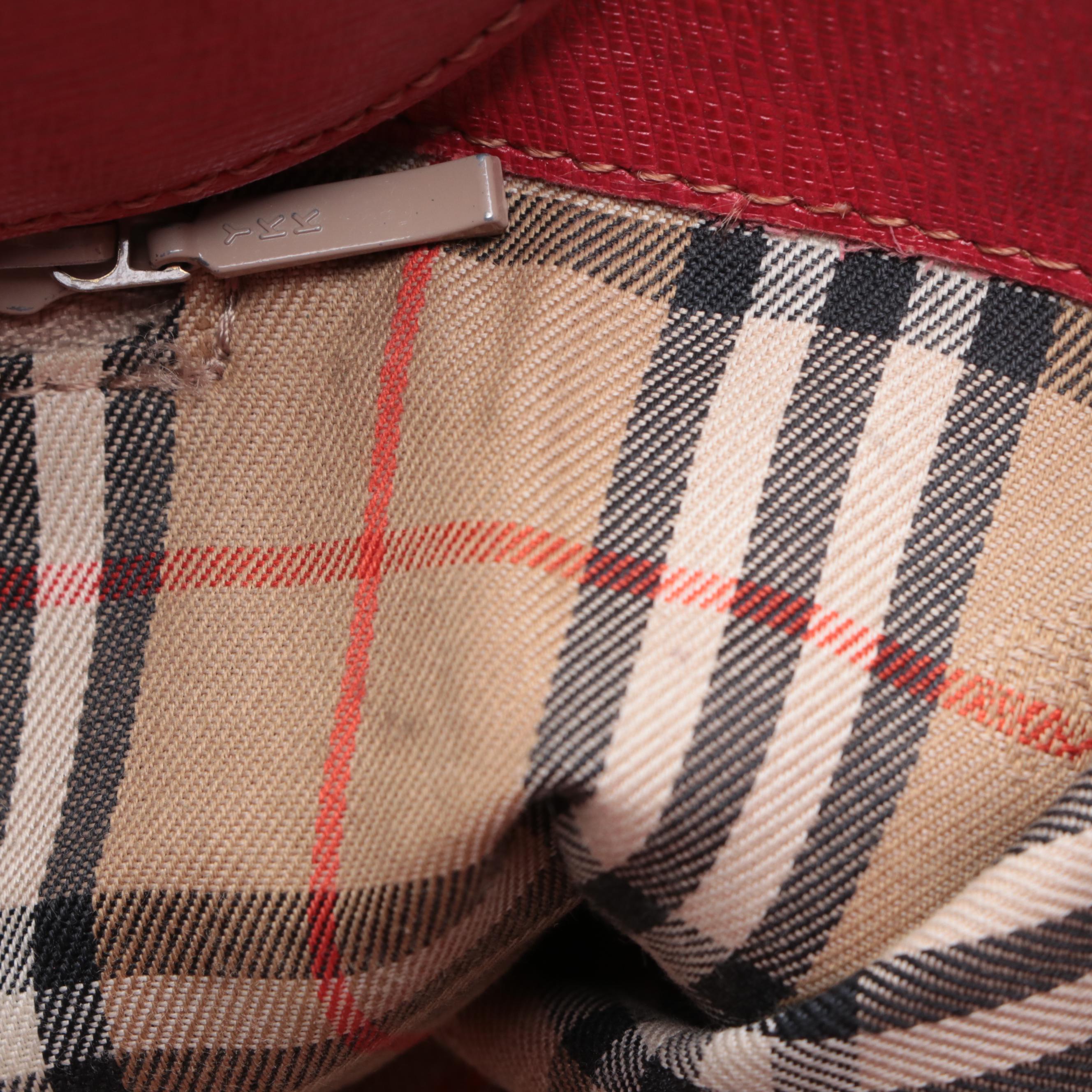 Burberrys Top Handle Handbag in Red Cross Grain Textured and Patent Leather