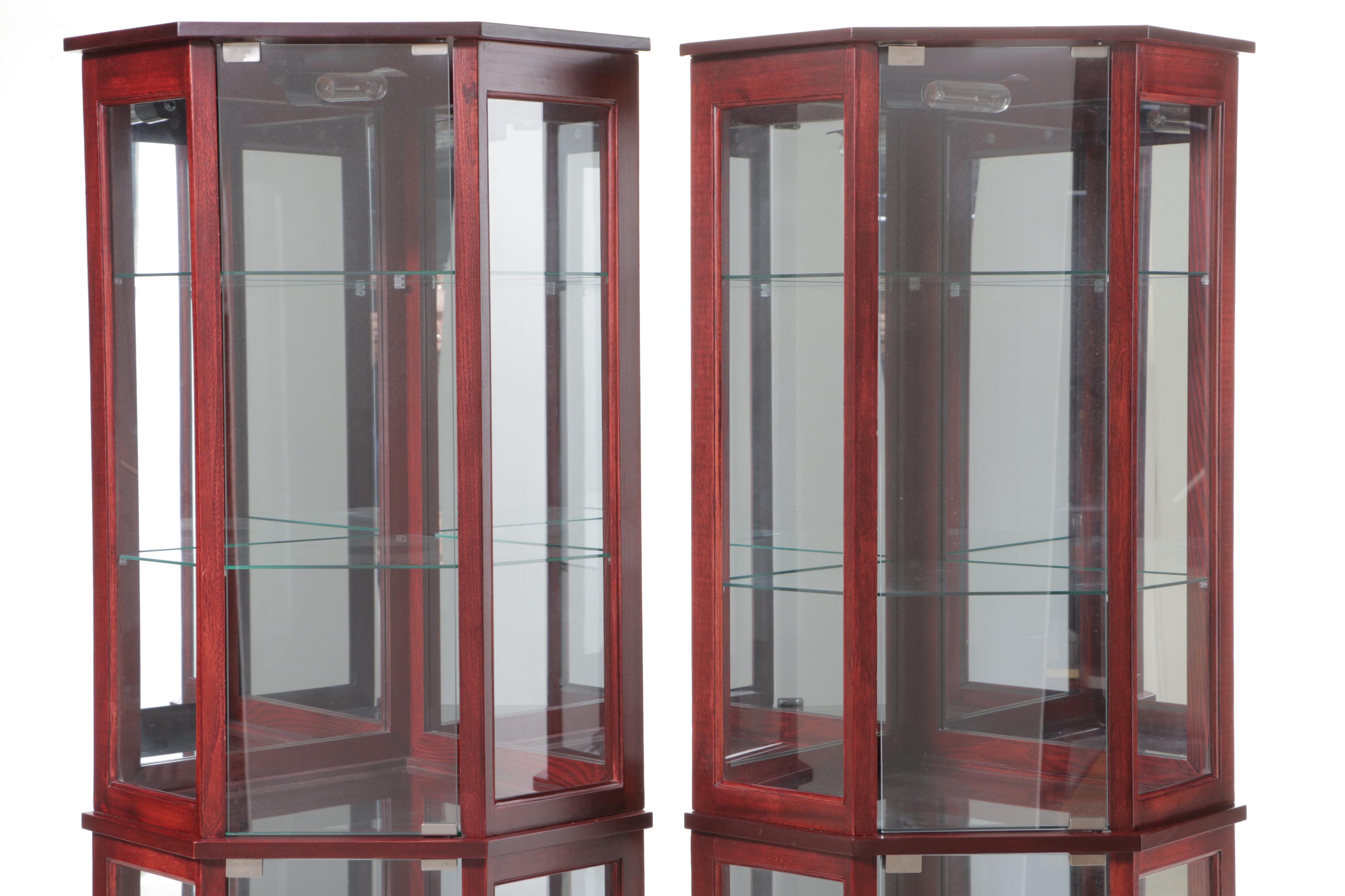 Pair of Mahogany Finish and Glass Illuminated Corner Display Cabinets