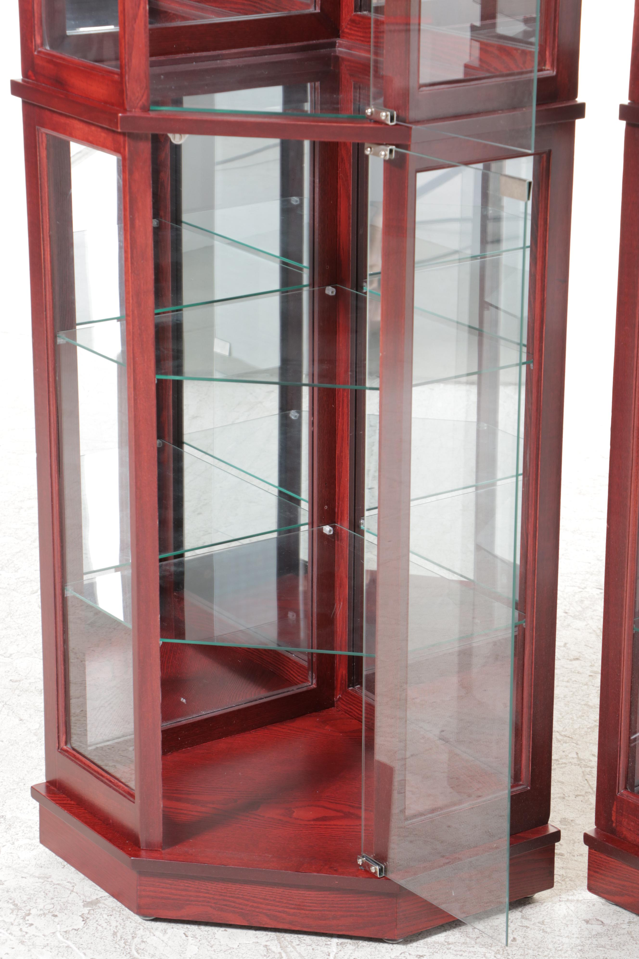 Pair of Mahogany Finish and Glass Illuminated Corner Display Cabinets