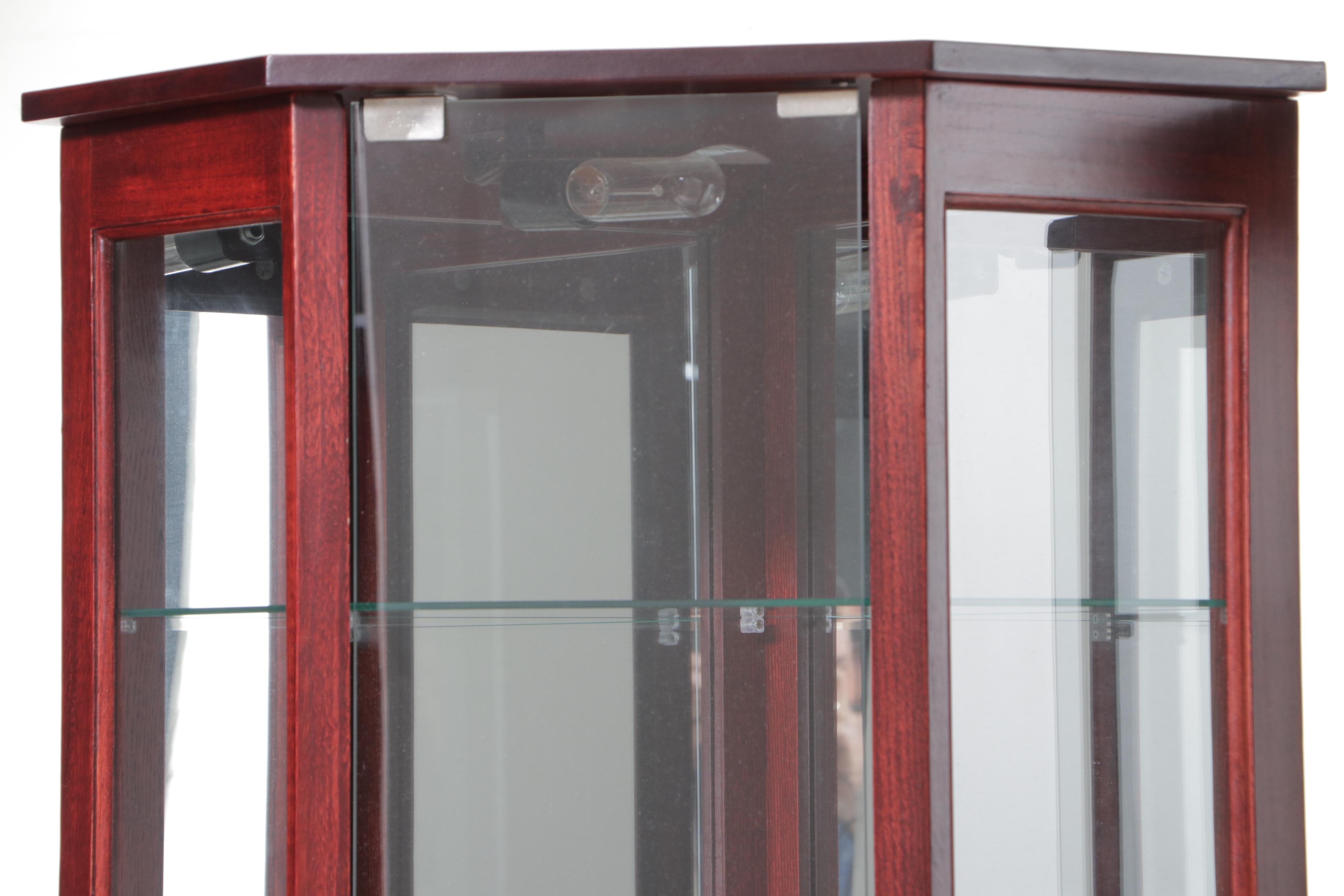 Pair of Mahogany Finish and Glass Illuminated Corner Display Cabinets