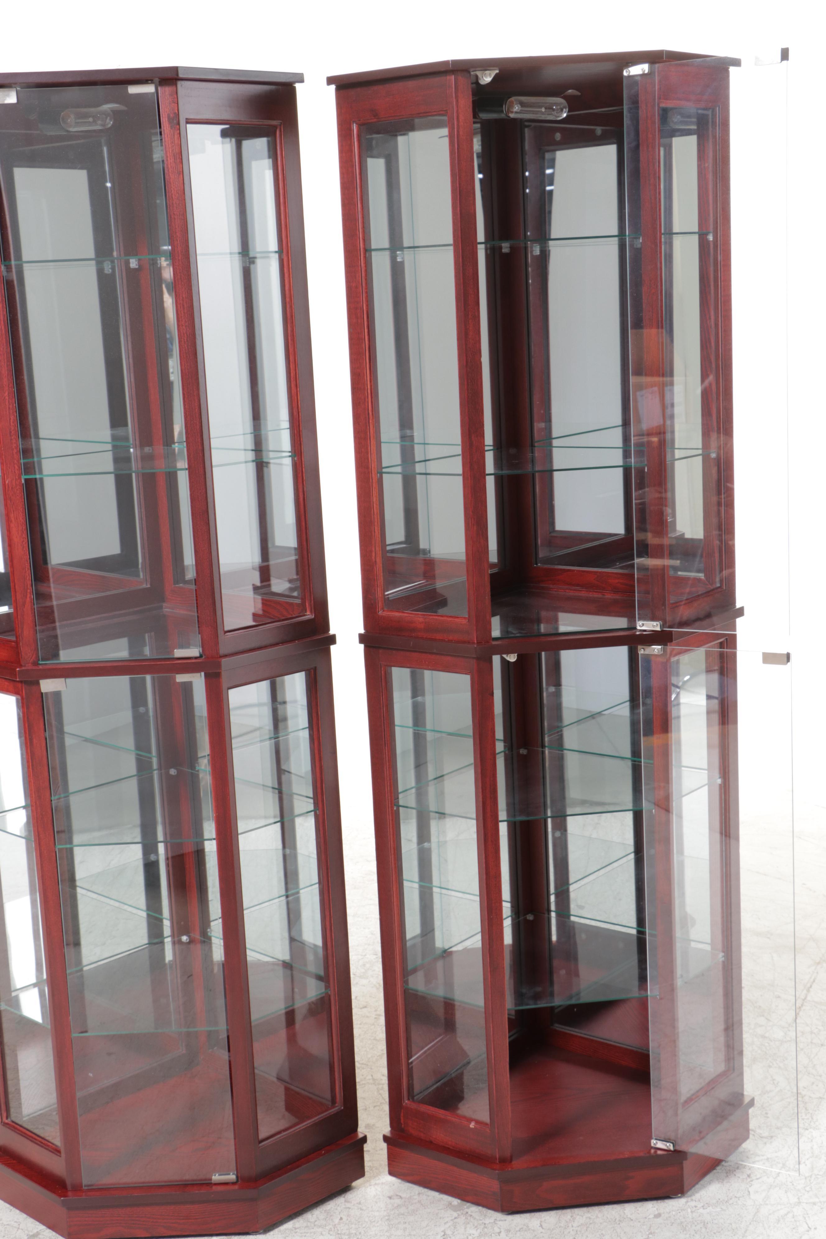 Pair of Mahogany Finish and Glass Illuminated Corner Display Cabinets