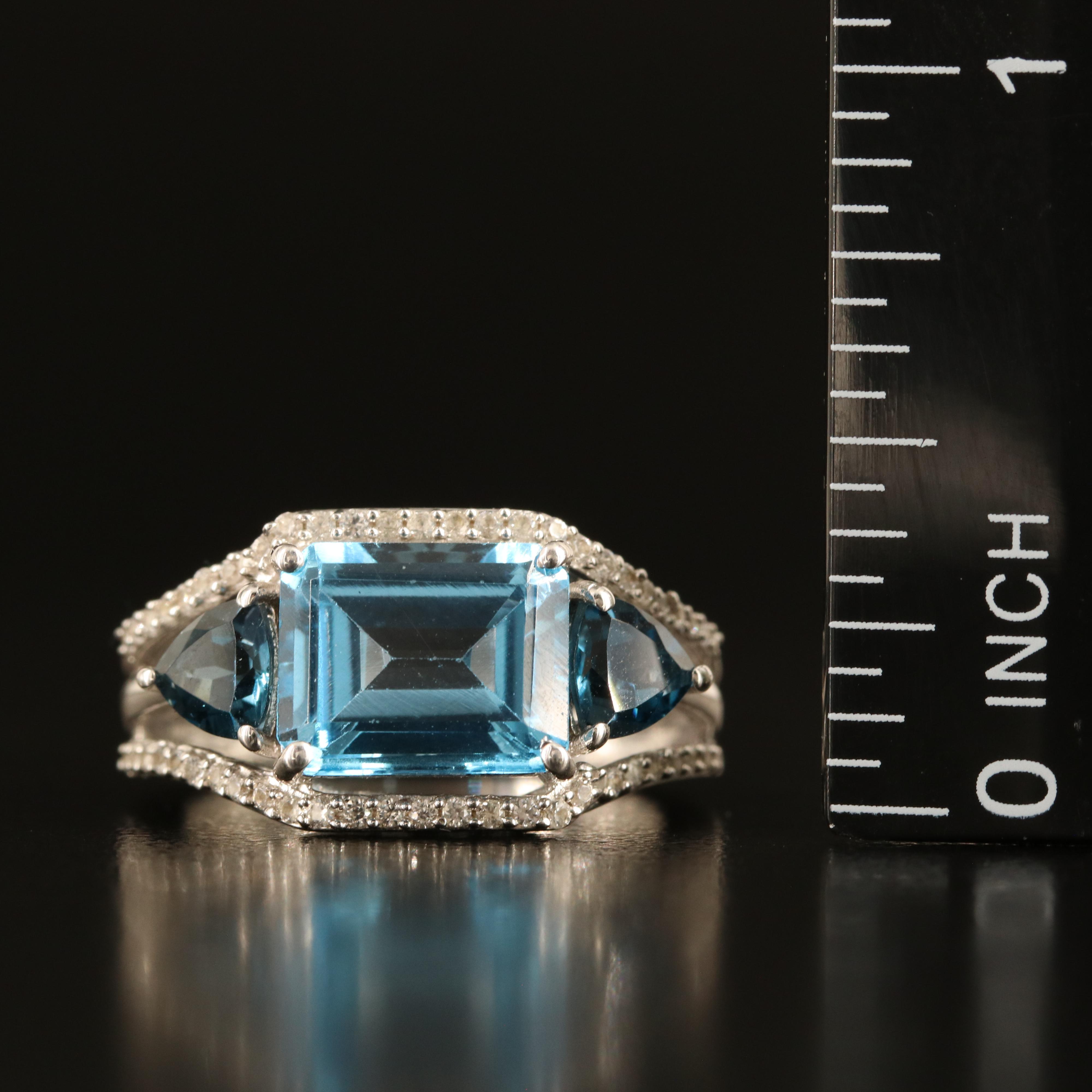 Sterling Swiss and London Blue Topaz Ring with White Sapphire Border